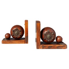 Pair of Art Deco faceted ball bookends in oak with metal decorations, France