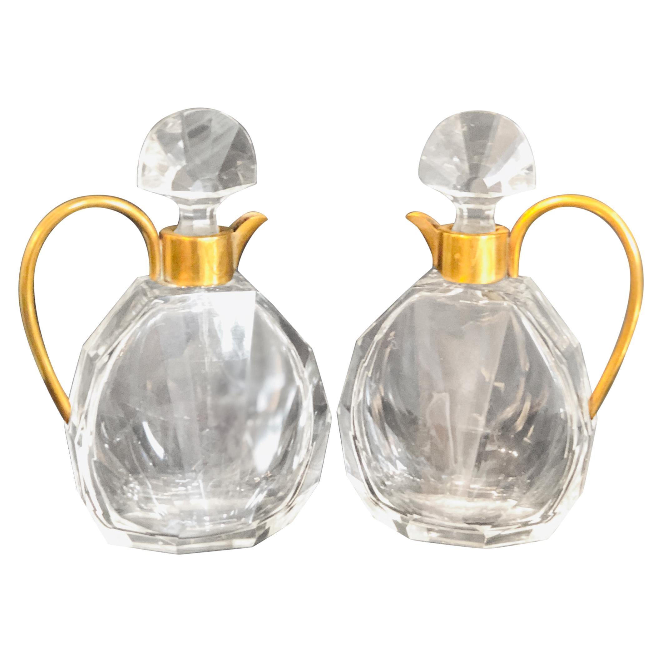 Pair of Art Deco Faceted Glass and Brass Petite Decanters