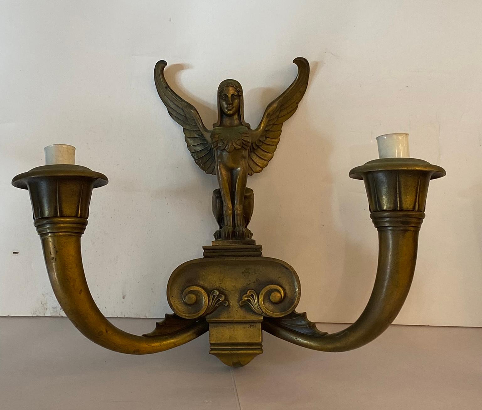 Cast Pair of art Deco Figural Bronze wall Sconces For Sale