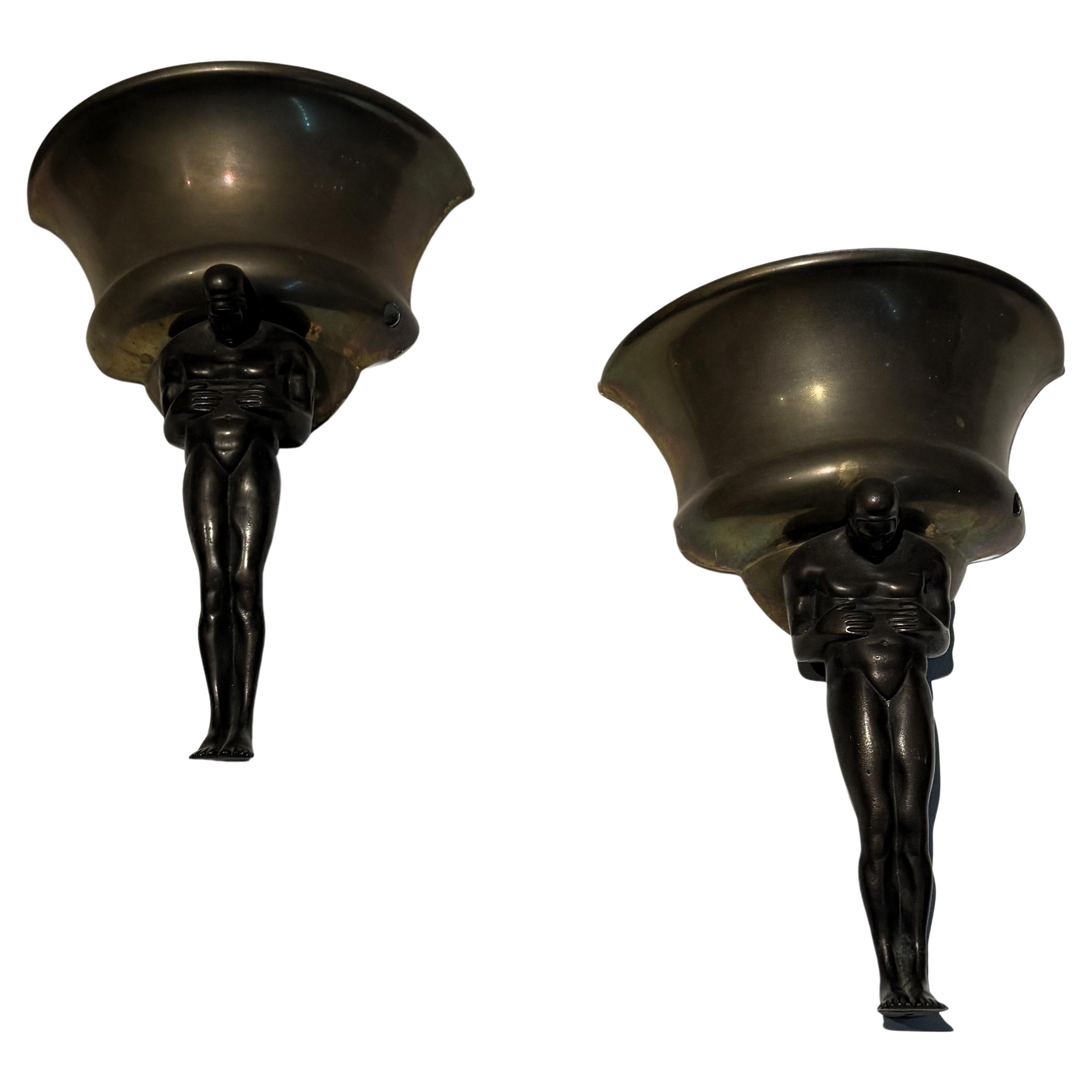 Paire d'appliques figuratives Art Déco, laiton et bronze, France circa 1920