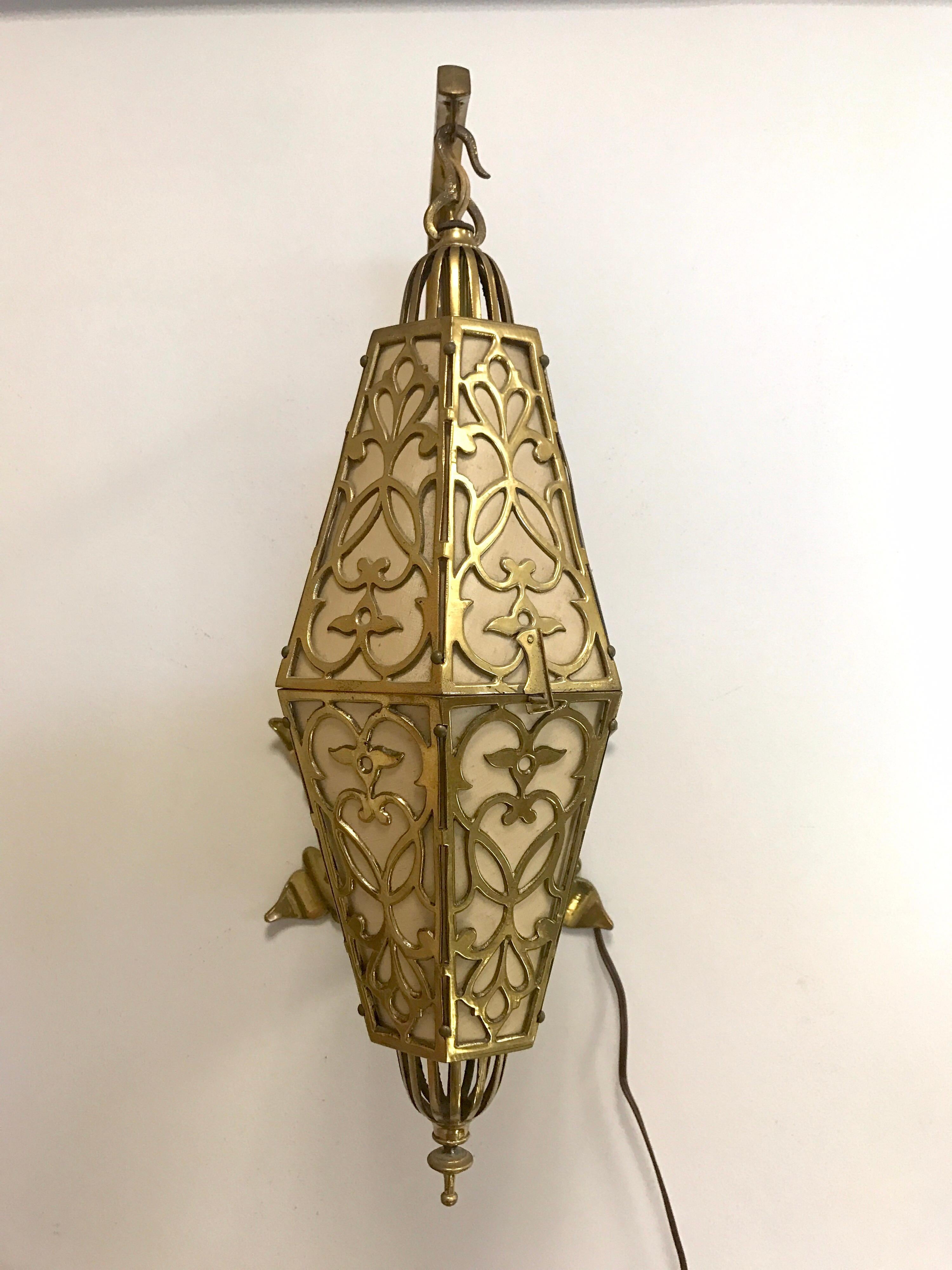 One of a kind French Art Deco sconces that open up, see pictures. Latticed brass throughout and nothing short of spectacular.