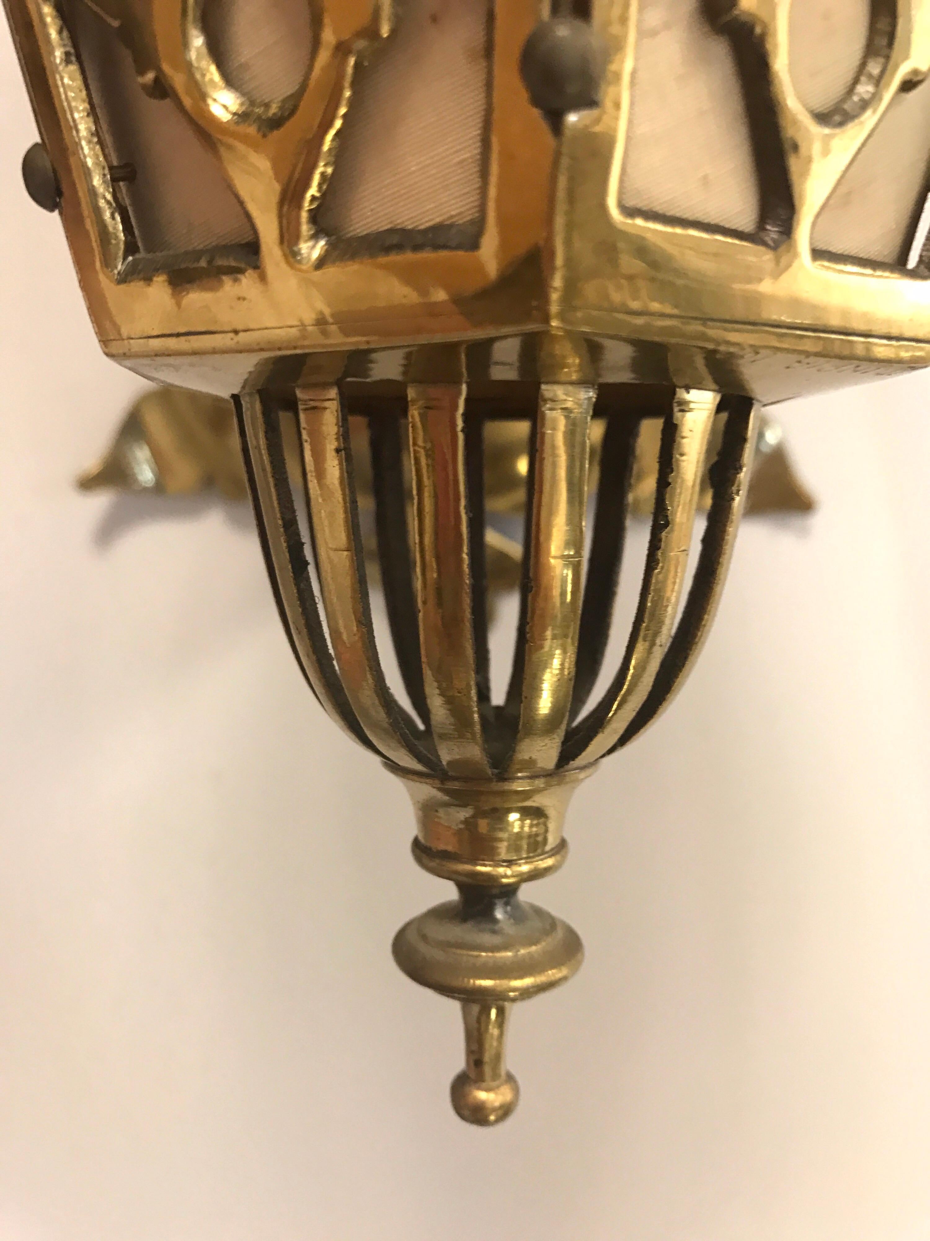 Mid-20th Century Pair of Art Deco French Latticed Brass Hanging Lanterns Sconces