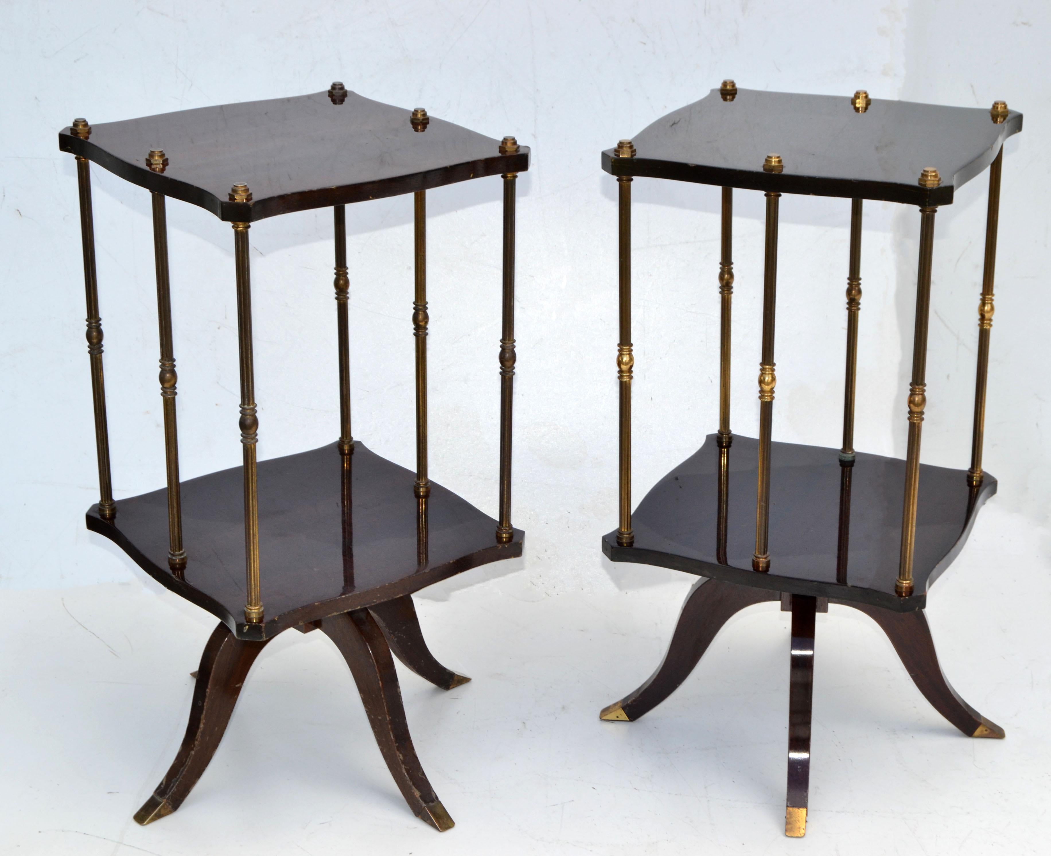 Superb Pair of square swivel Drink Tables, Sofa Tables or Side Tables in laminated and lacquered Mahogany with masterful crafted Brass Details.
The elegant feet of the base have brass sabots.
The swivel function works smoothly and makes these