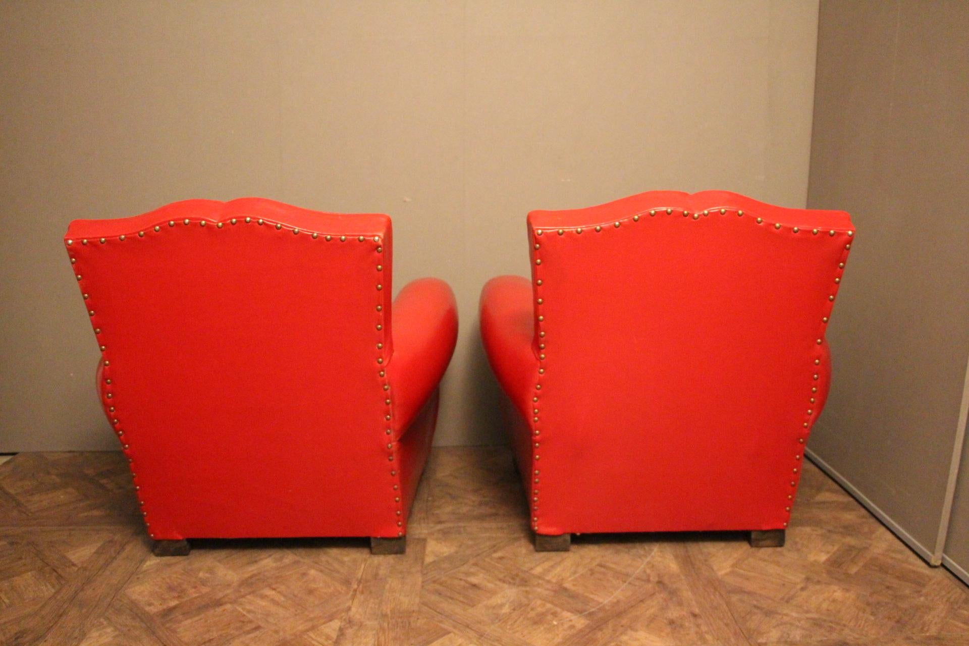 Paar französische Art-Déco-Clubsessel mit senffarbener Rückenlehne aus rotem Leder (Mitte des 20. Jahrhunderts) im Angebot