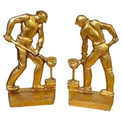Pareja de sujetalibros de hierro dorado estilo Art Decó de la WPA para hombres de fundición Firmado NMF 1936