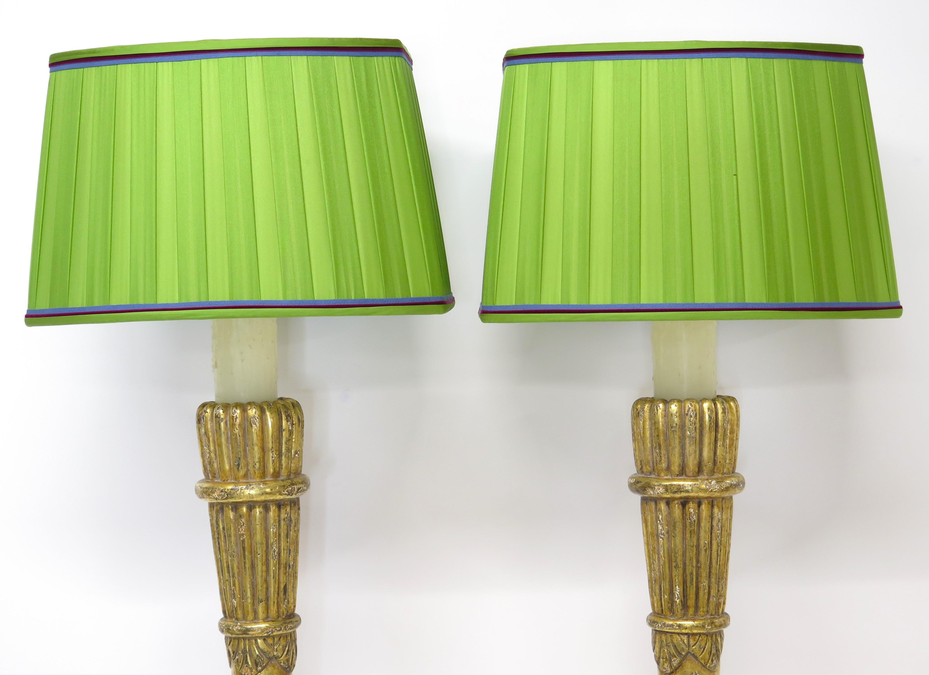 French Pair of Art Deco Giltwood Sconces in the Form of Stylized Wall Torches For Sale