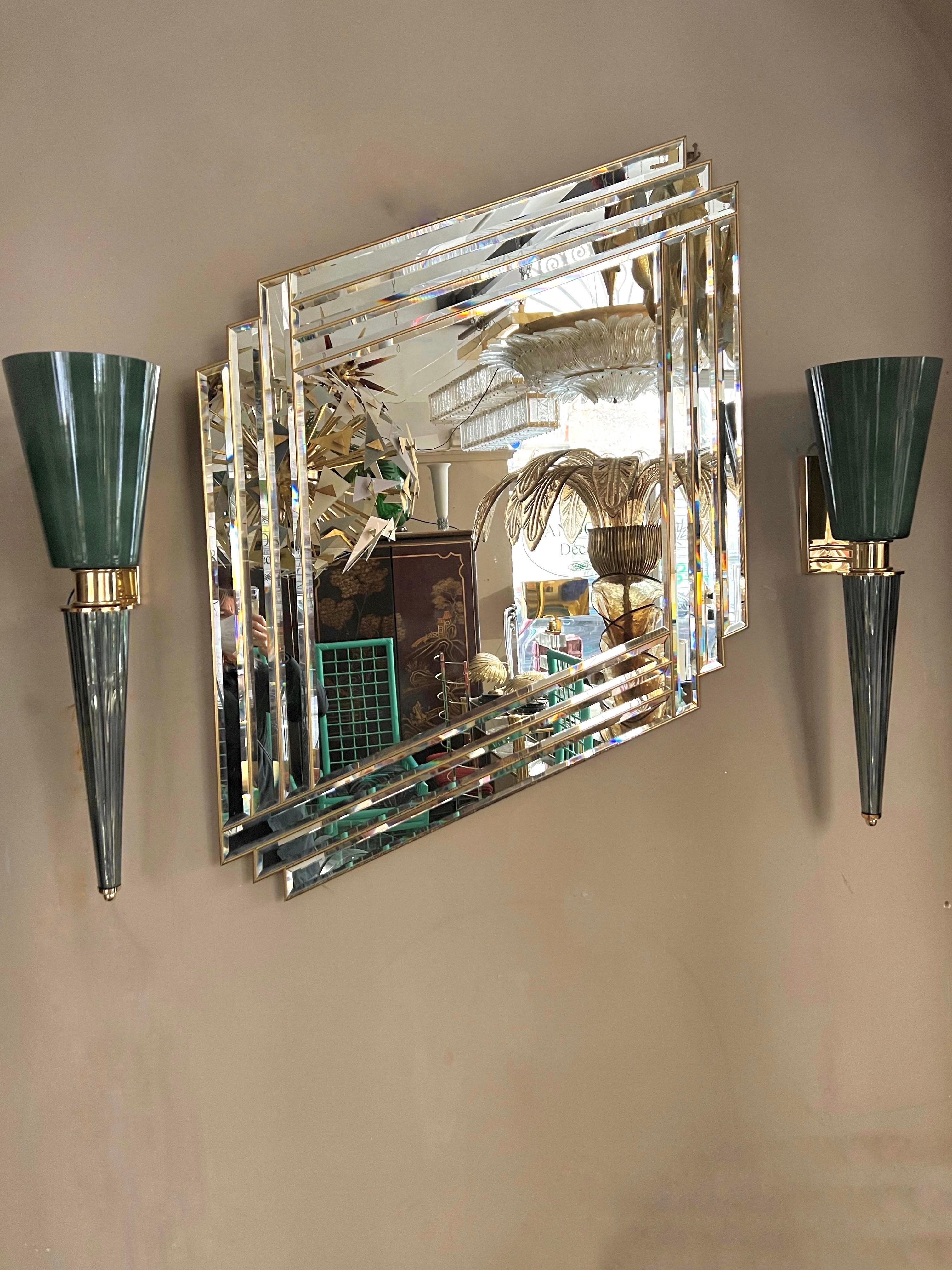Pair of Art Deco sage green conical Murano wall sconces, brass fittings. The cup is 