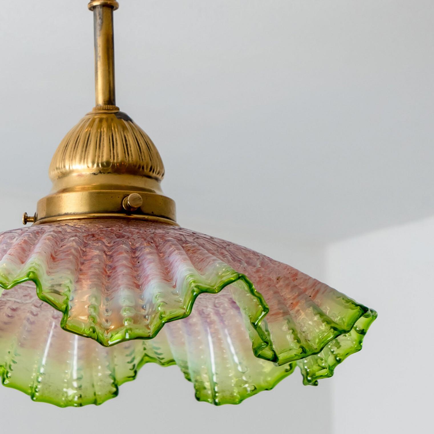 Pair of lovely antique lampshade in beautiful pink and green in the centre with wavy / scalloped edges,  with brass holder
Origin France, ca 1910s - 1930s. High-end pieces.

Dimensions:
Height: 11.8 