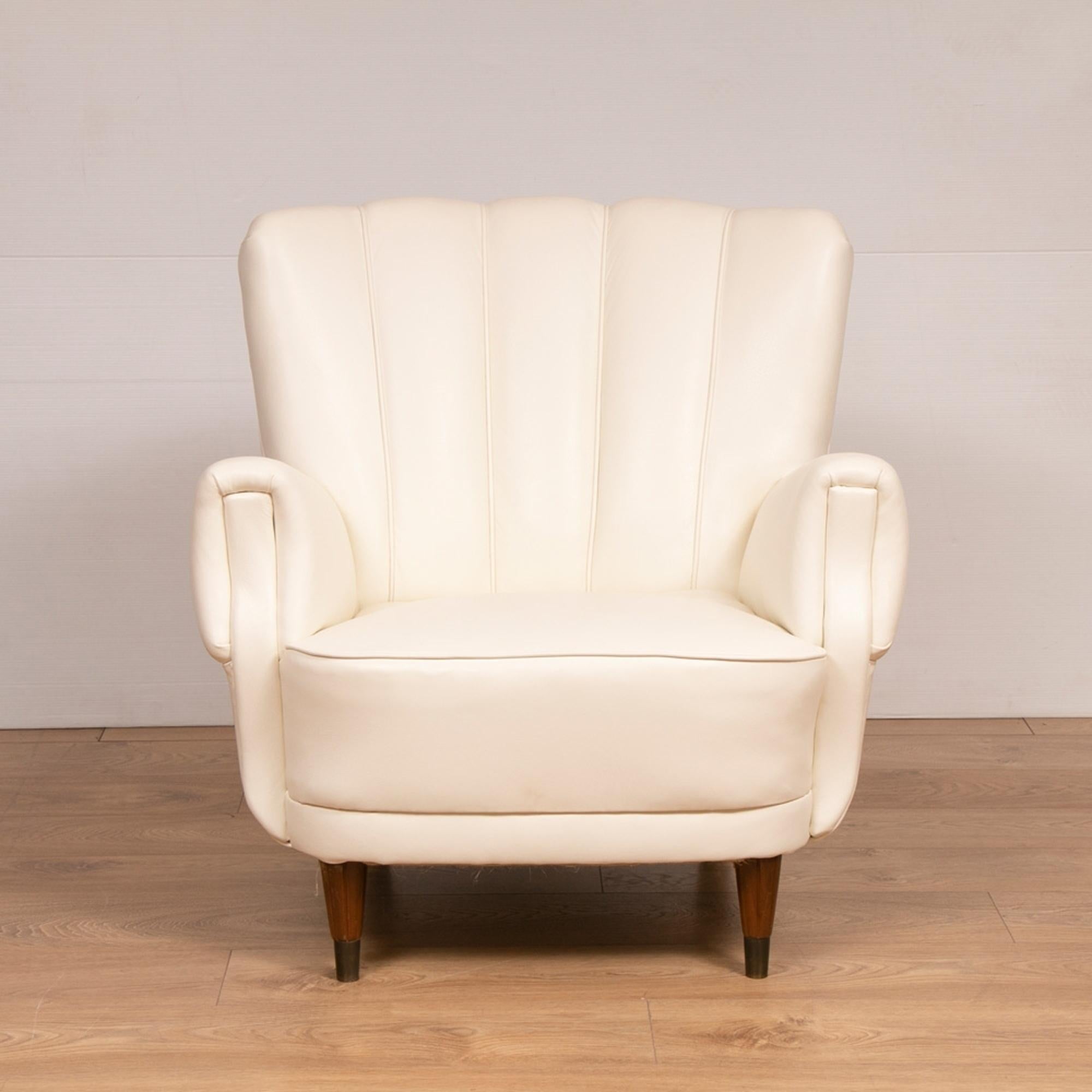 A pair of Art Deco armchairs newly upholstered in soft ivory white leather.
These are a Classic Art Deco design and we have completely reupholstered the chairs and used a traditional cow hide leather in Ivory white a finished in traditional