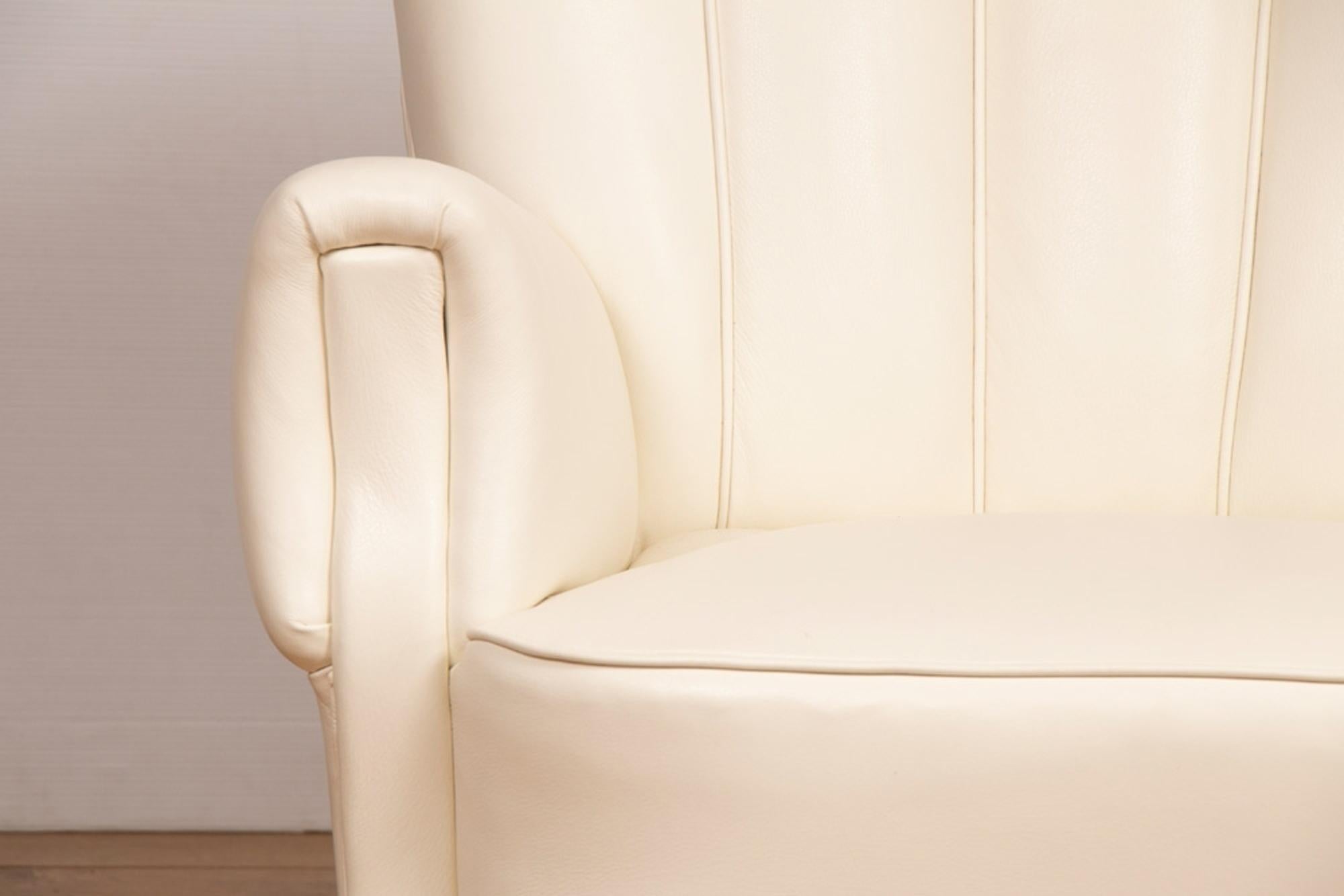 French Pair of Art Deco Ivory Leather Armchairs, circa 1930
