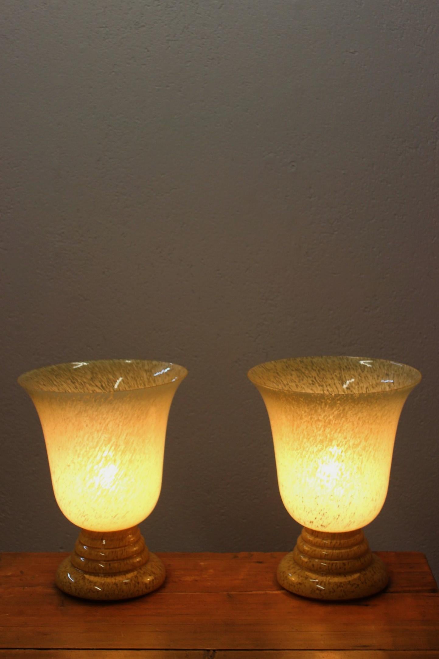 Pair of Art Deco period French Clichy glass lamps with a classic shape, electrical wiring has been changed to meet modern standards but keeping the original bulb fitting. 

In very good condition, very small chips on the rim. 