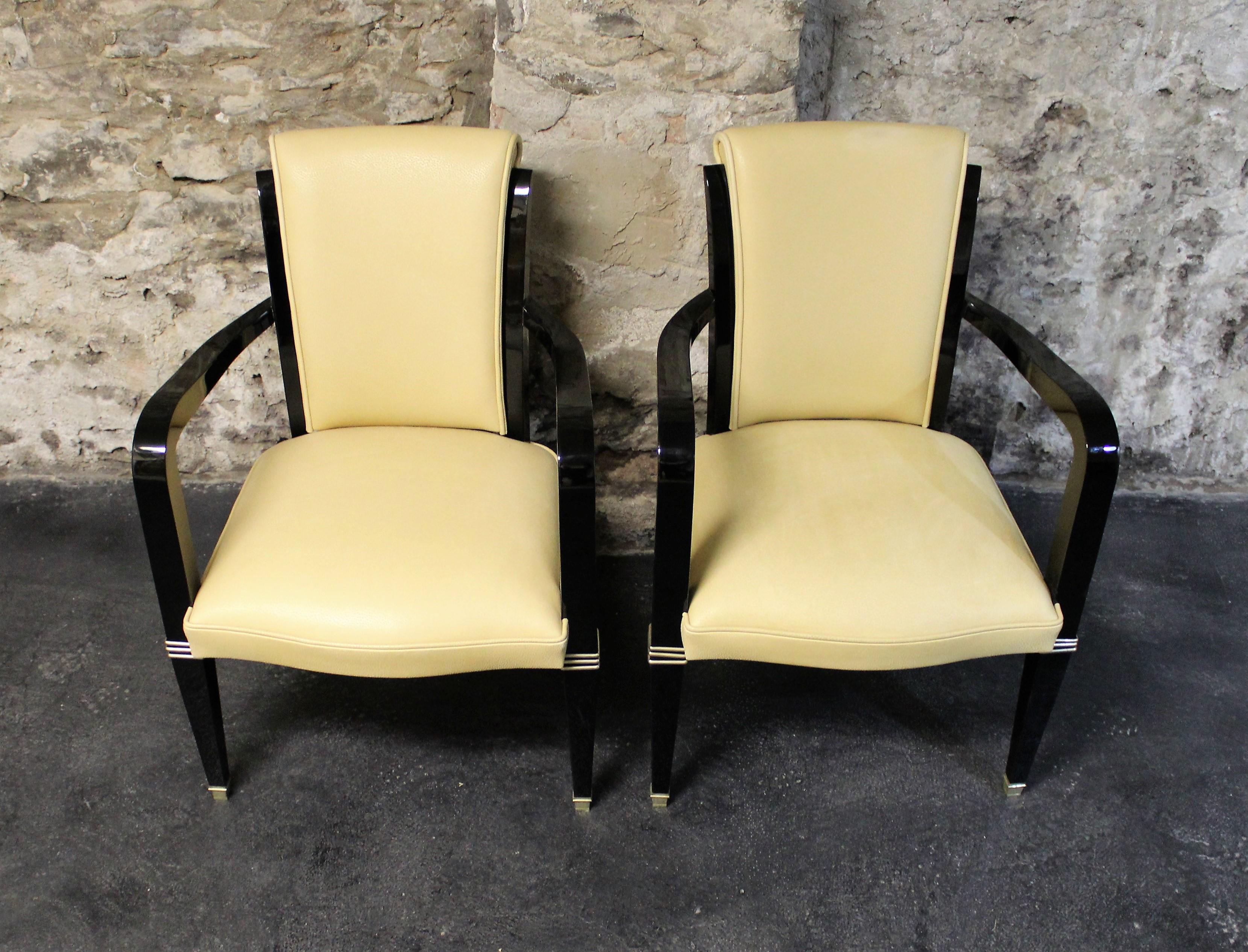 20th Century Pair of Art Deco Leather and Polished Ebonized Frame Armchairs