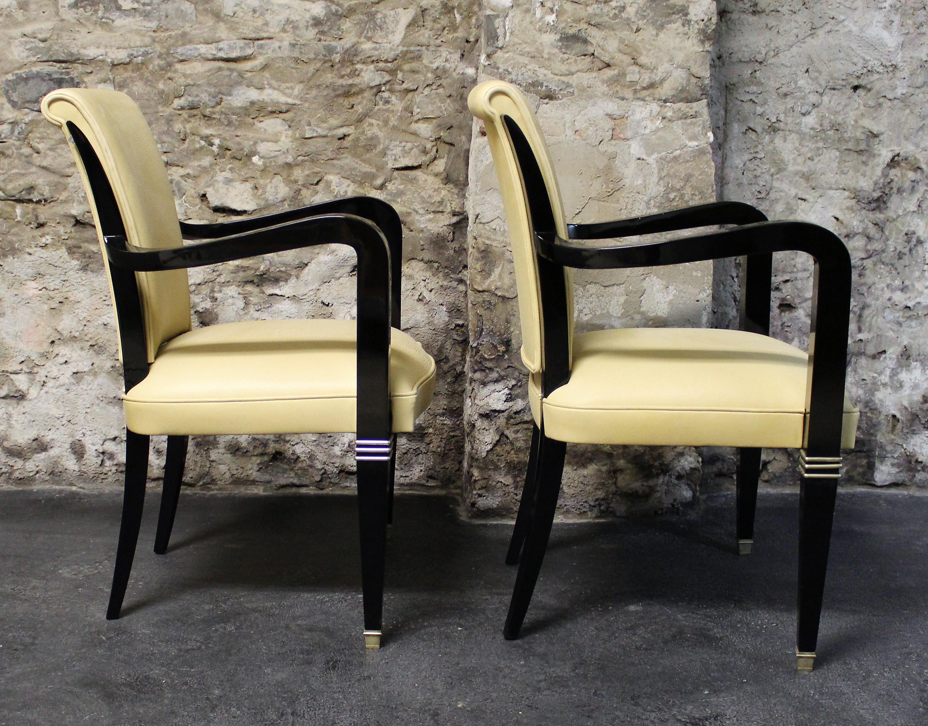 Upholstery Pair of Art Deco Leather and Polished Ebonized Frame Armchairs