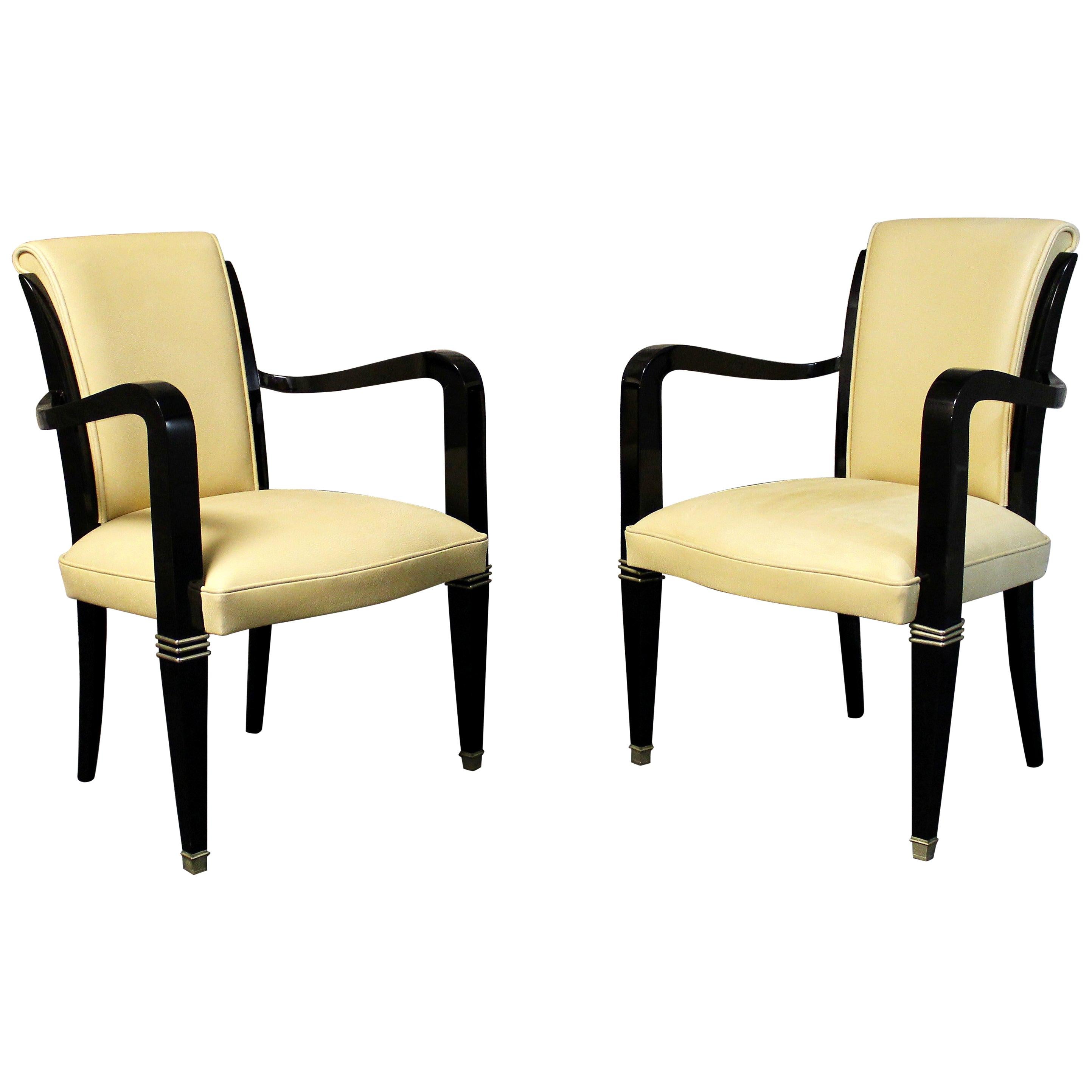 Pair of Art Deco Leather and Polished Ebonized Frame Armchairs For Sale