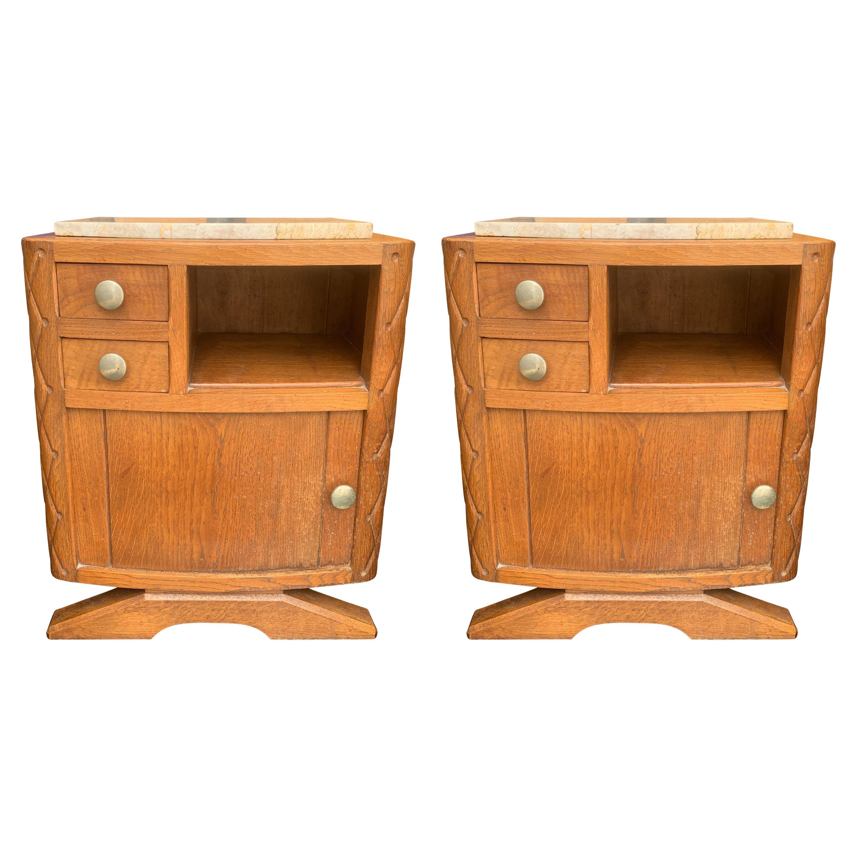 Matching Pair of Art Deco limed oak, carved oak marble topped nightstands with two drawers & cupboard 1920s

Measures: height to top: 58 cm 
height to top of marble: 60 cm.