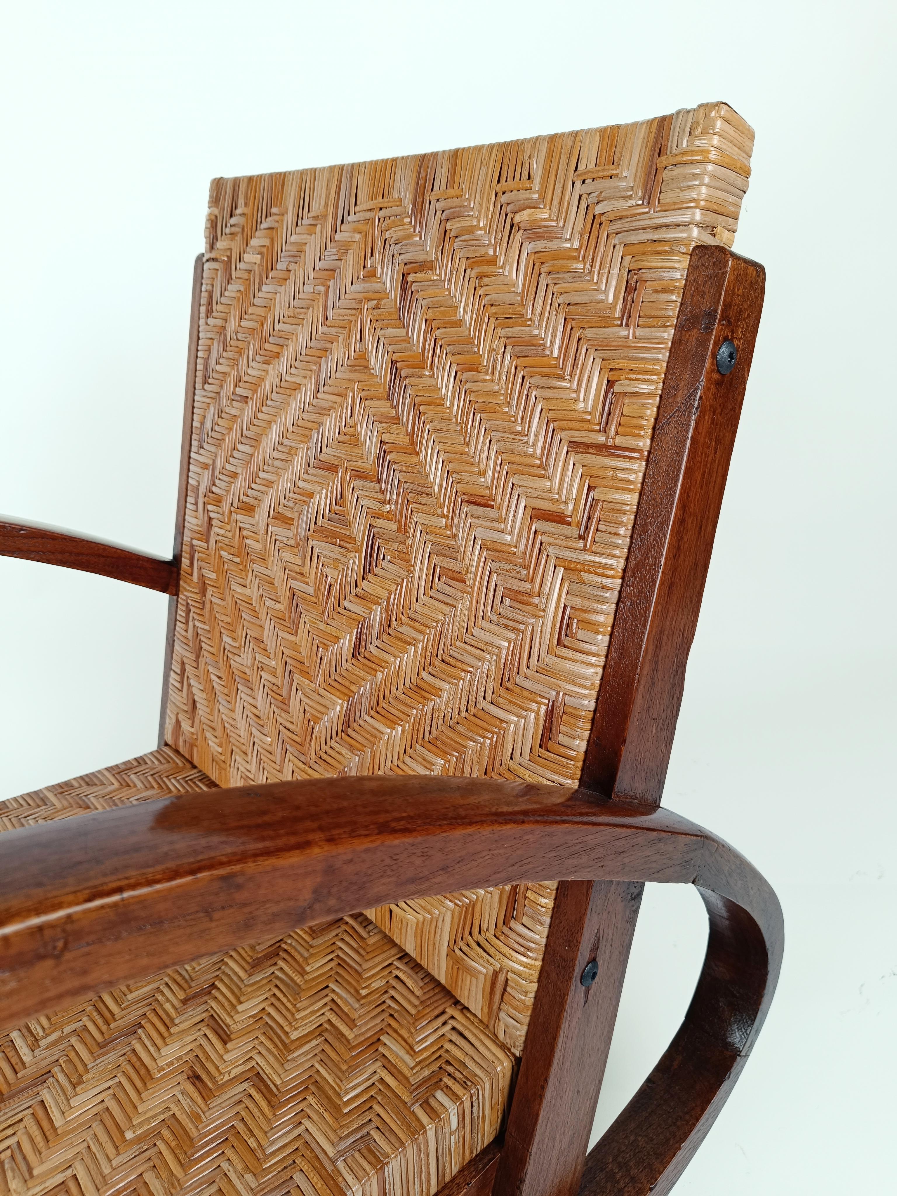 A Pair of Original Art Deco Armchairs, probably made in Italy by amazing craftsmen, between the 1920s and 1930s.
This set is made up of 2 Mid Century Armchairs in solid hardwood with cane seats.
The elegance of the art deco style is visible in the