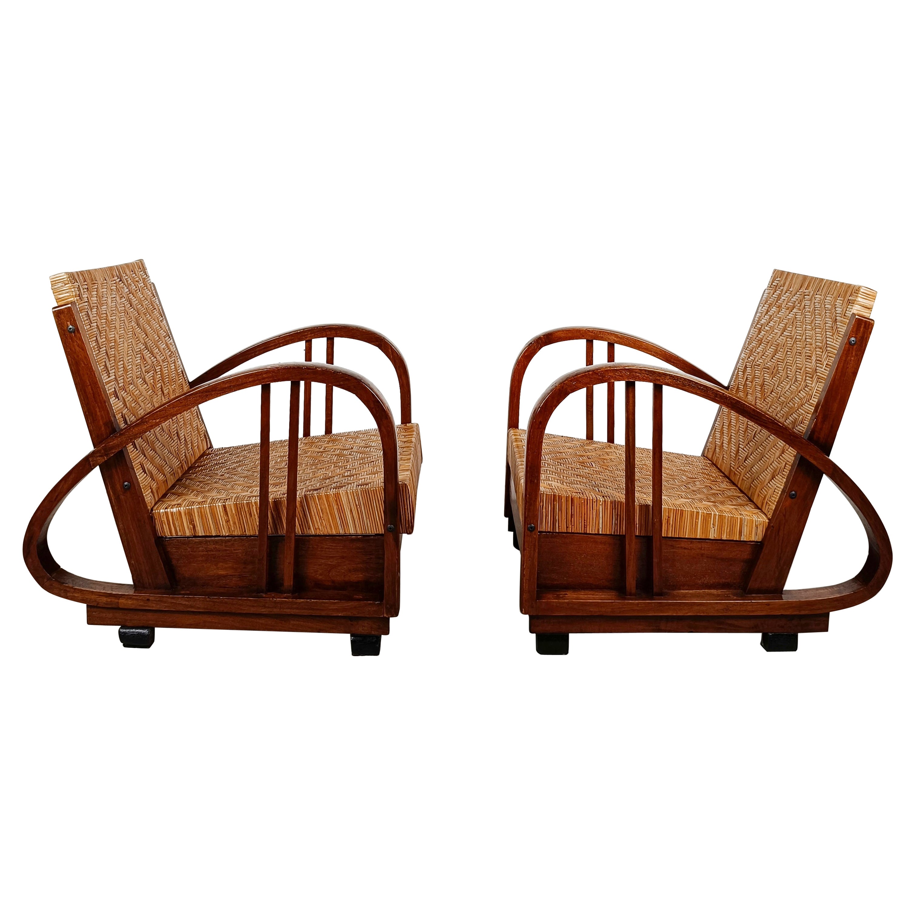 Paire de chaises longues Art déco en teck et rotin dans le style de Francis Jourdain