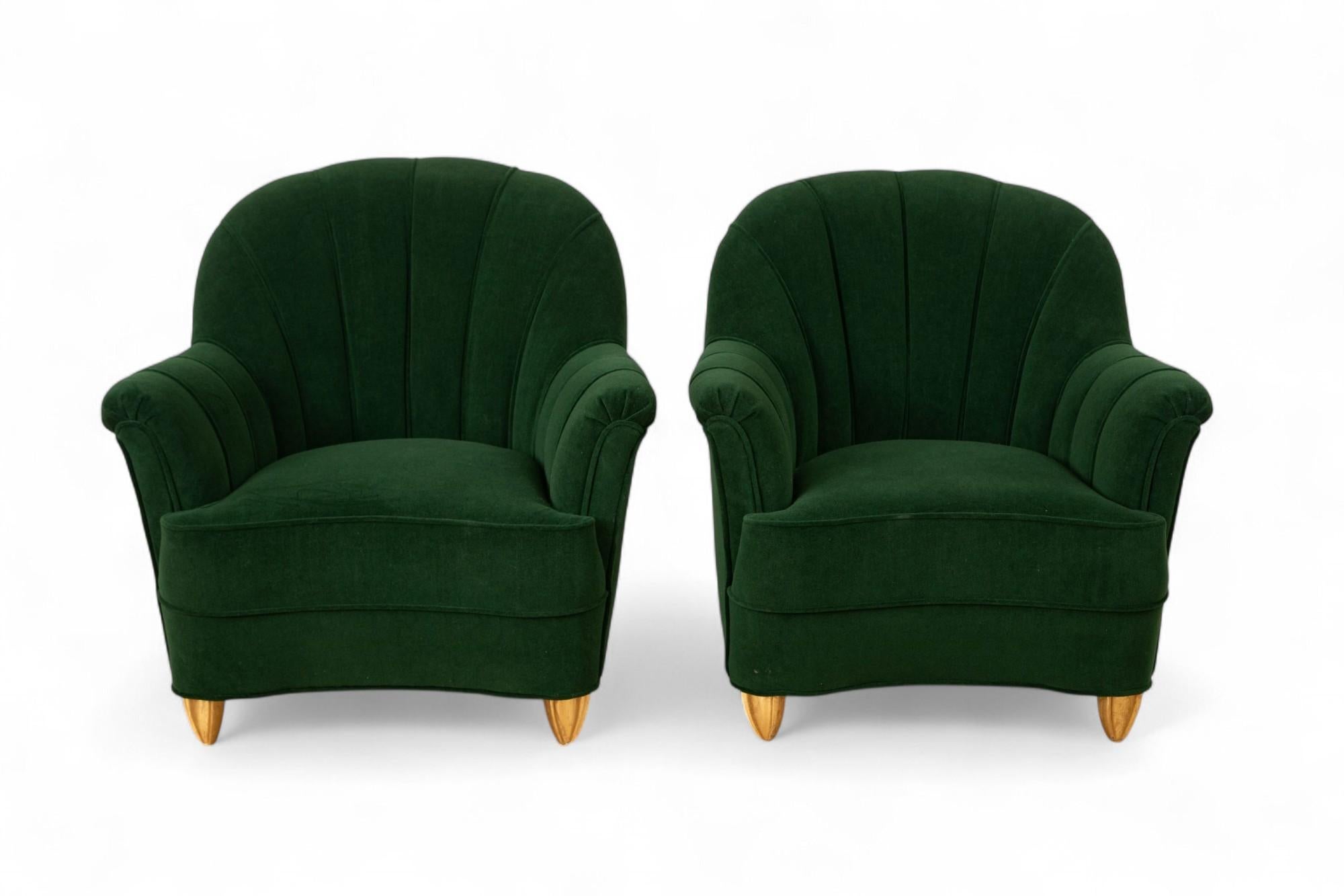 Pair of Art Deco lounge chairs in the style of Guglielmo Ulrich,
 Italy circa 1950
This striking pair of  lounge chairs embodies the refined glamour and craftsmanship of early 20th-century European design. Newly restored to perfection, the chairs