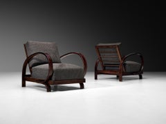 Pair of Art Deco Lounge Chairs with Sculptural Wooden Curved Armrests