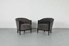 Pair of Art Deco Lounge Chairs with Upholstered Frame and Black Carved Wood
