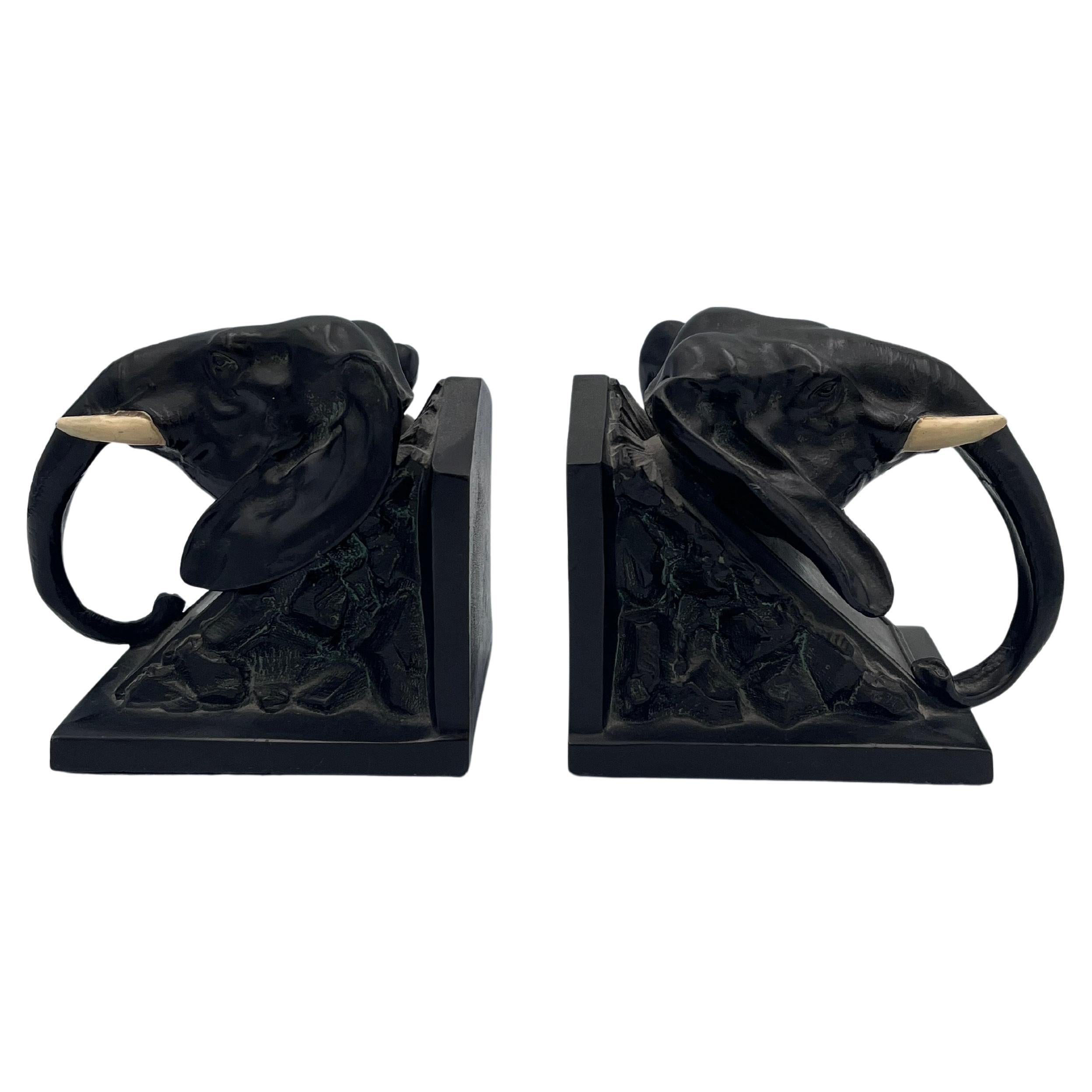 Rare 1922 Louis Vincent Aronson Art Deco Elephant Head Bookends – Sculptural Metal with Cold-Painted Details

This striking pair of Art Deco elephant head bookends by renowned designer Louis Vincent Aronson, dated 1922, showcases the bold geometry