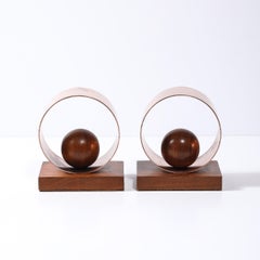 Coppia di reggilibri in rame e noce in stile Art Deco Machin AGE a forma di anello