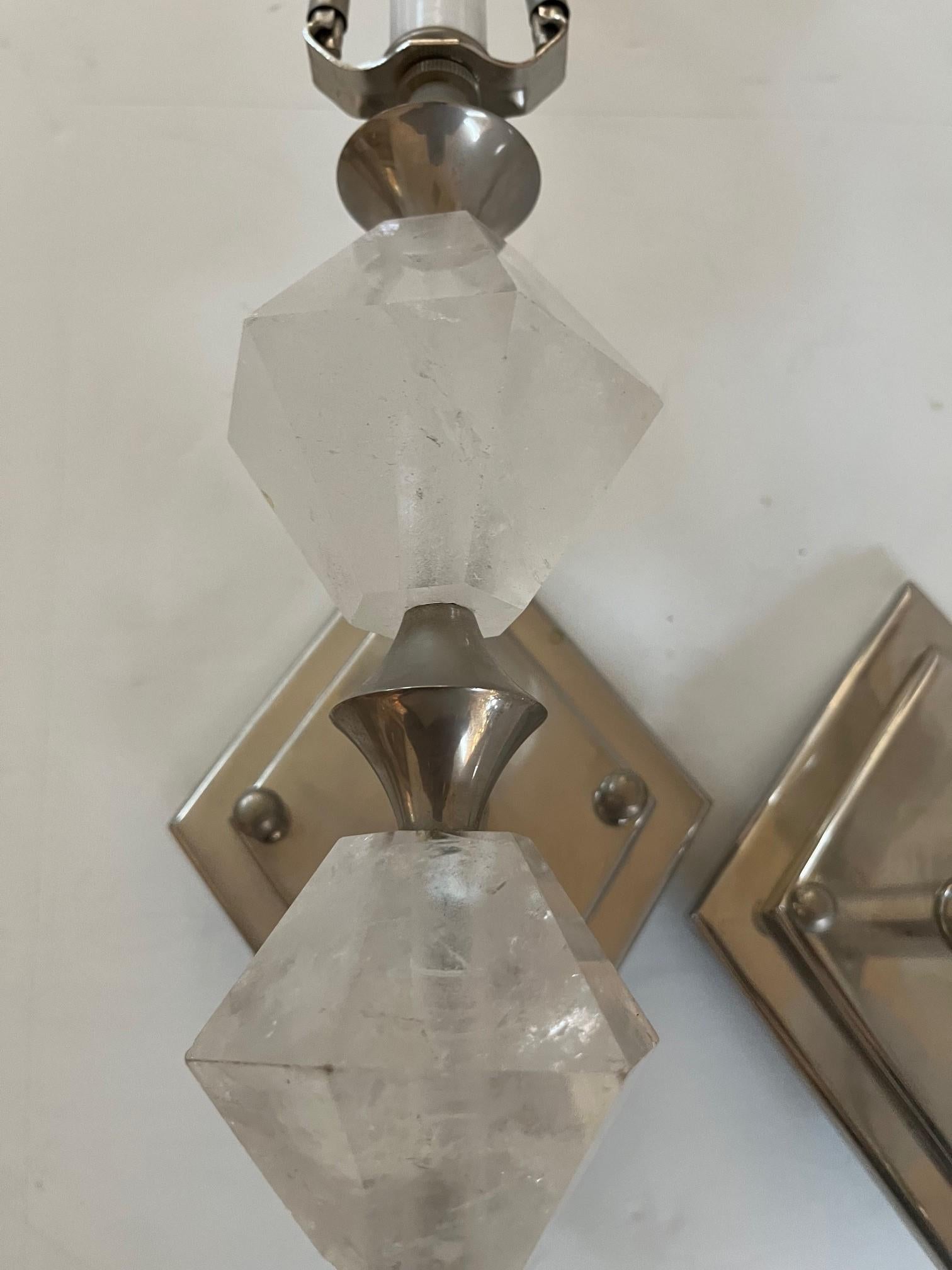 Pair of Art Deco Modern Rock Crystal Sconces Designed by Interior Designer in Los Angeles, Custom Made in Diamond Shape Design with a Double Diamond back Plate in Hi Polished Nickle Finish, Rock Crystal Imported from Brazil, Sconces have a Single