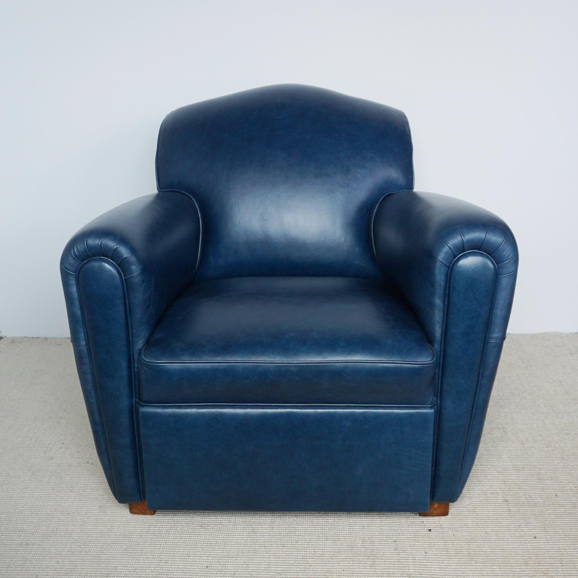 A pair of Art Deco moustache backed club armchairs. Re-upholstered in cobalt blue leather.

Dimensions: H 75cm W 85cm D 85cm Seat H 37cm W 42cm D 54cm

Origin: French

Date: Circa 1940

Item Number: 2003241

All of our furniture is extensively