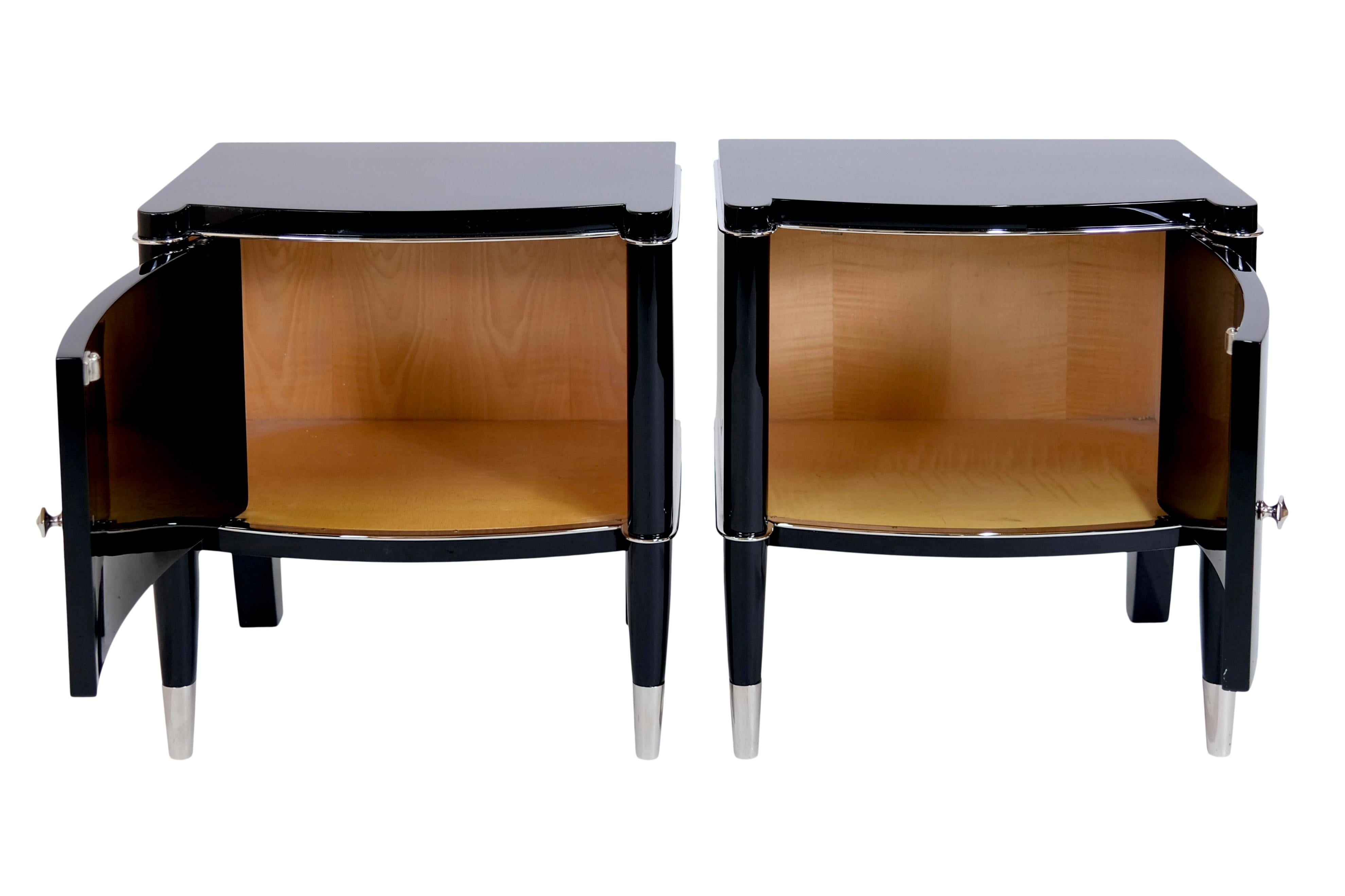 Night Stands from the Belgian Furniture Manufactory DeCoene Frères. 
Well known Art Déco Furniture, Belgium 1940s 
Two furniture, one with a left-locking door and one with a right-locking door. 

Fresh Black Piano Lacquer 
All Metal Applications