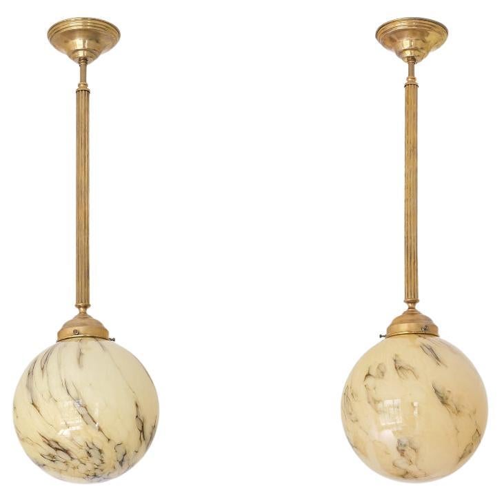 Pair of Art Deco Pendants in Brass and Marbled Glass, De La Mar Theatre, 1940s For Sale