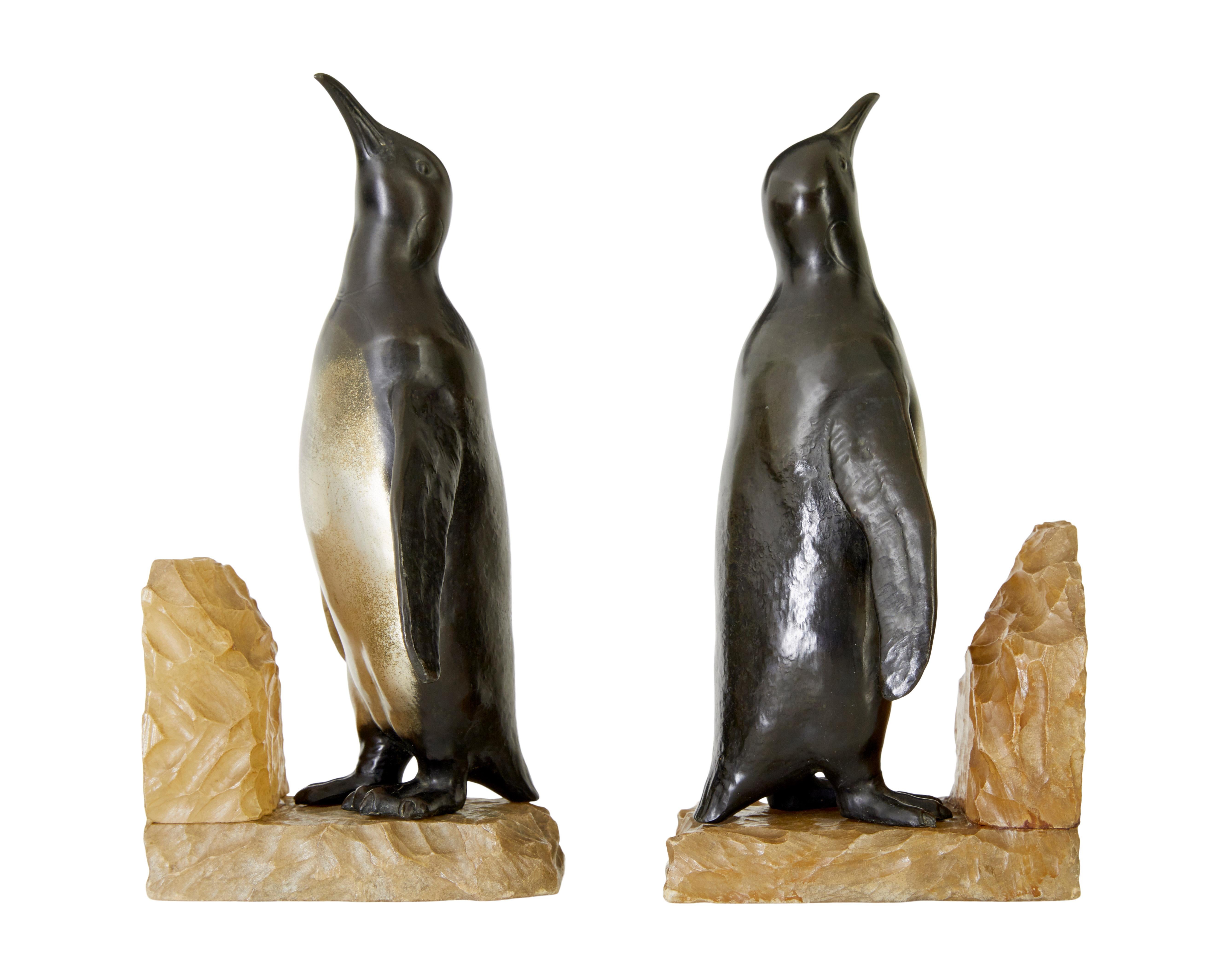 Cast Pair of Art Deco penguin and alabaster book ends
