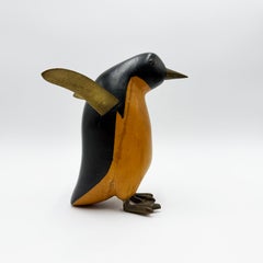 Ein Paar Art-déco-Pinguin-Skulpturen aus Holz und Bronze