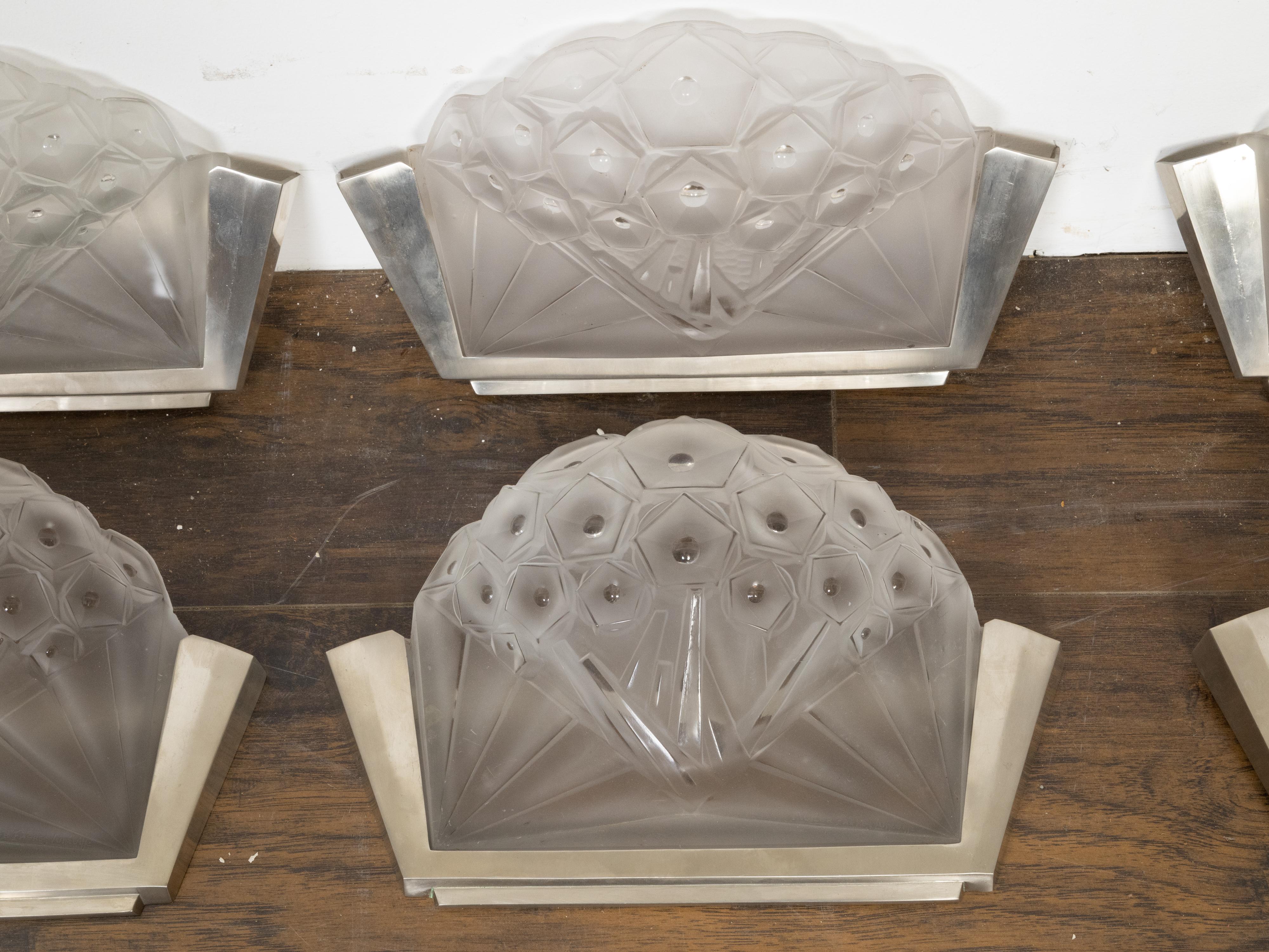 20th Century Pair of Art Deco Period Molded Glass Wall Sconces in Silvered Metal Mounts For Sale