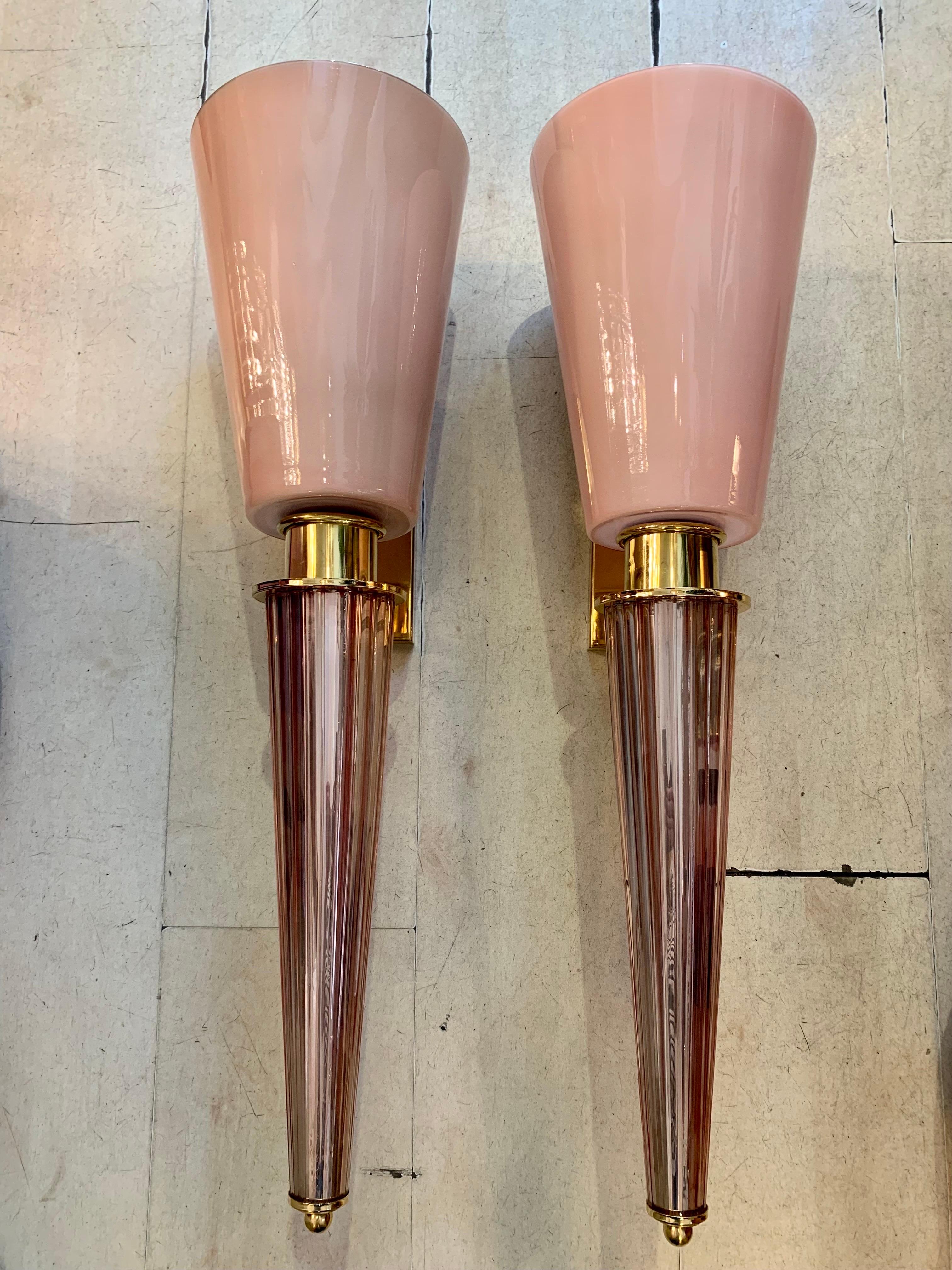 Pair of Art Deco pink conical Murano glass wall sconces, brass fittings. The cup is 