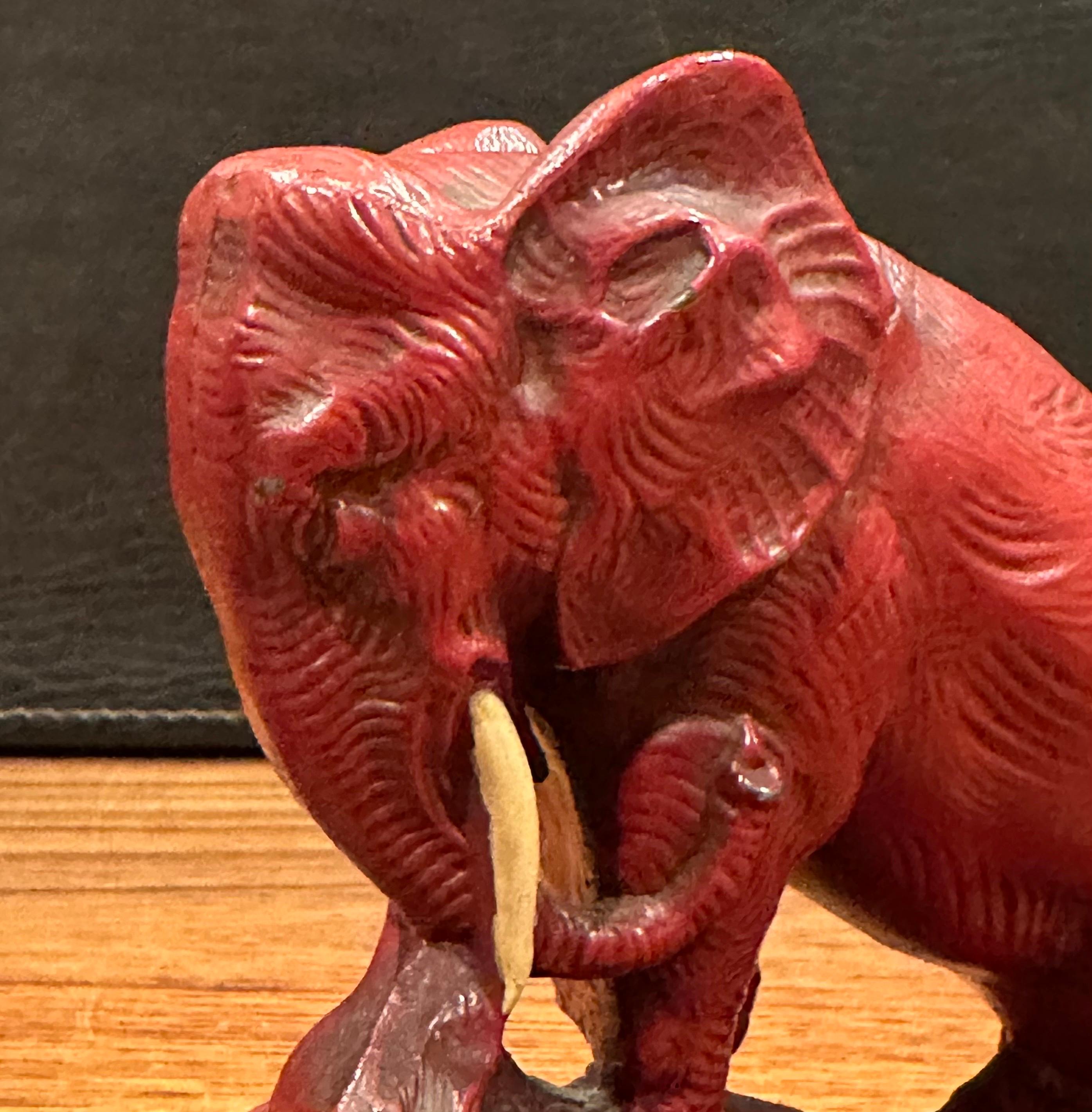 Pair of Art Deco Red Painted Charging Elephant Bookends For Sale 7