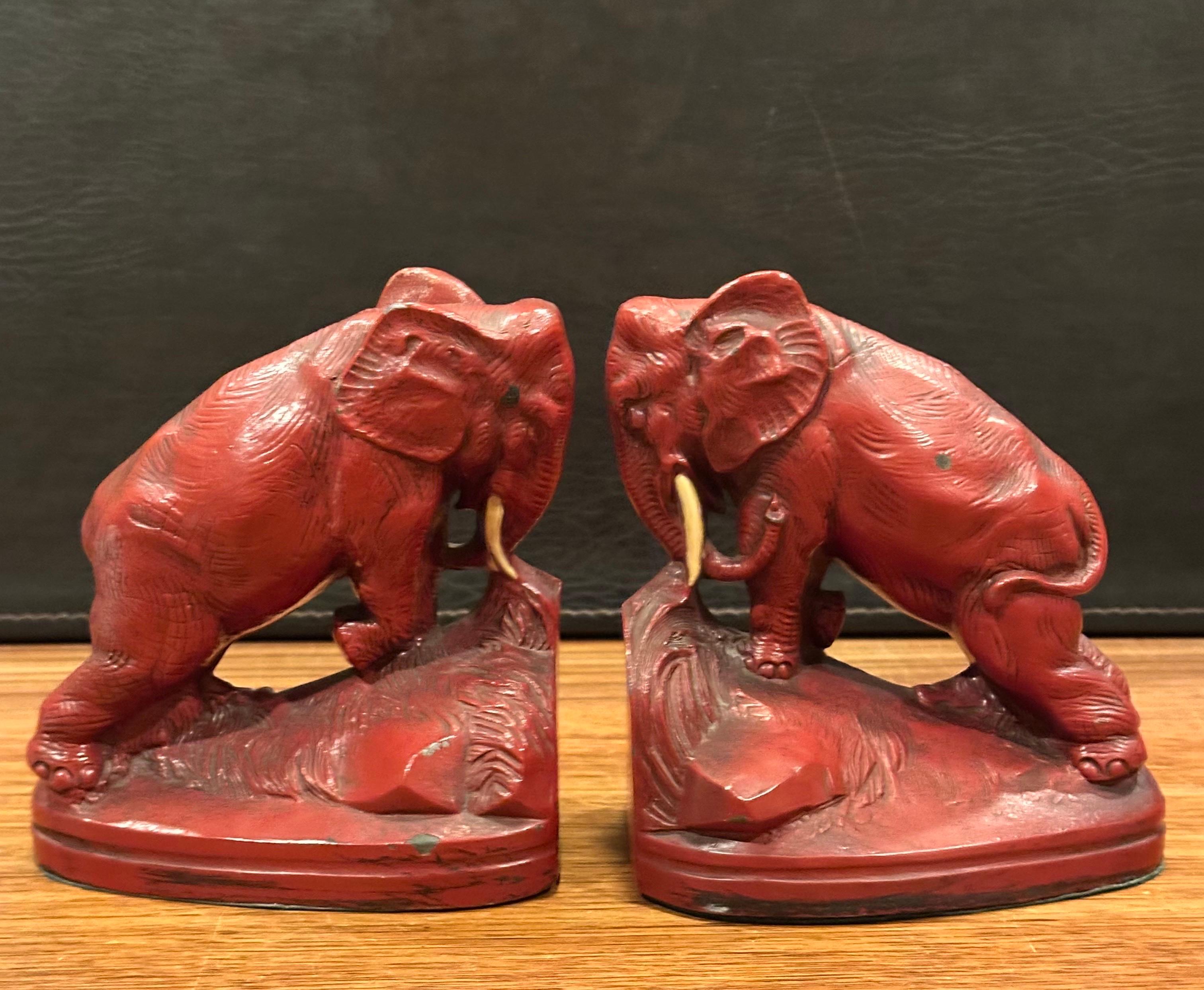 Pair of Art Deco Red Painted Charging Elephant Bookends For Sale 9