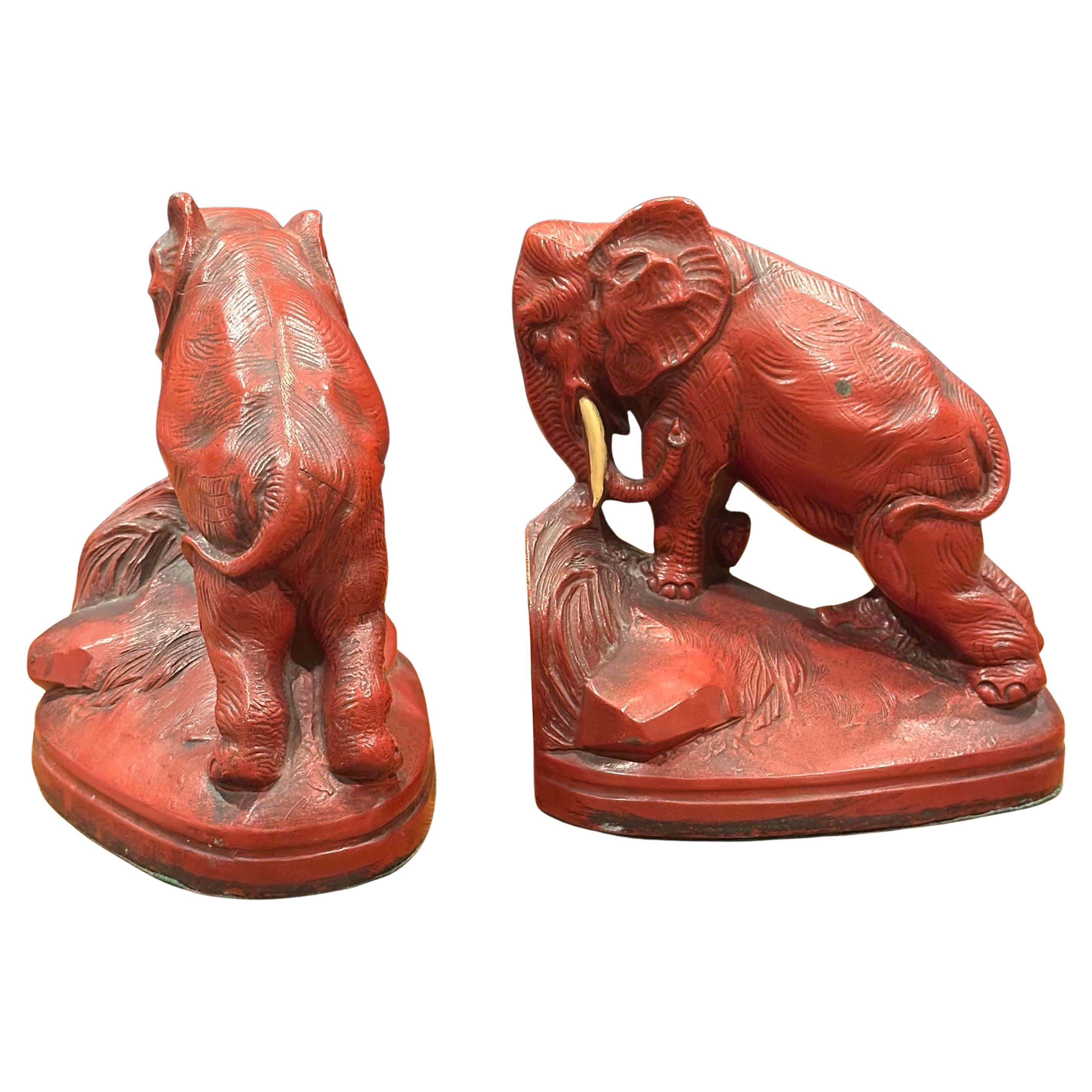American Pair of Art Deco Red Painted Charging Elephant Bookends For Sale