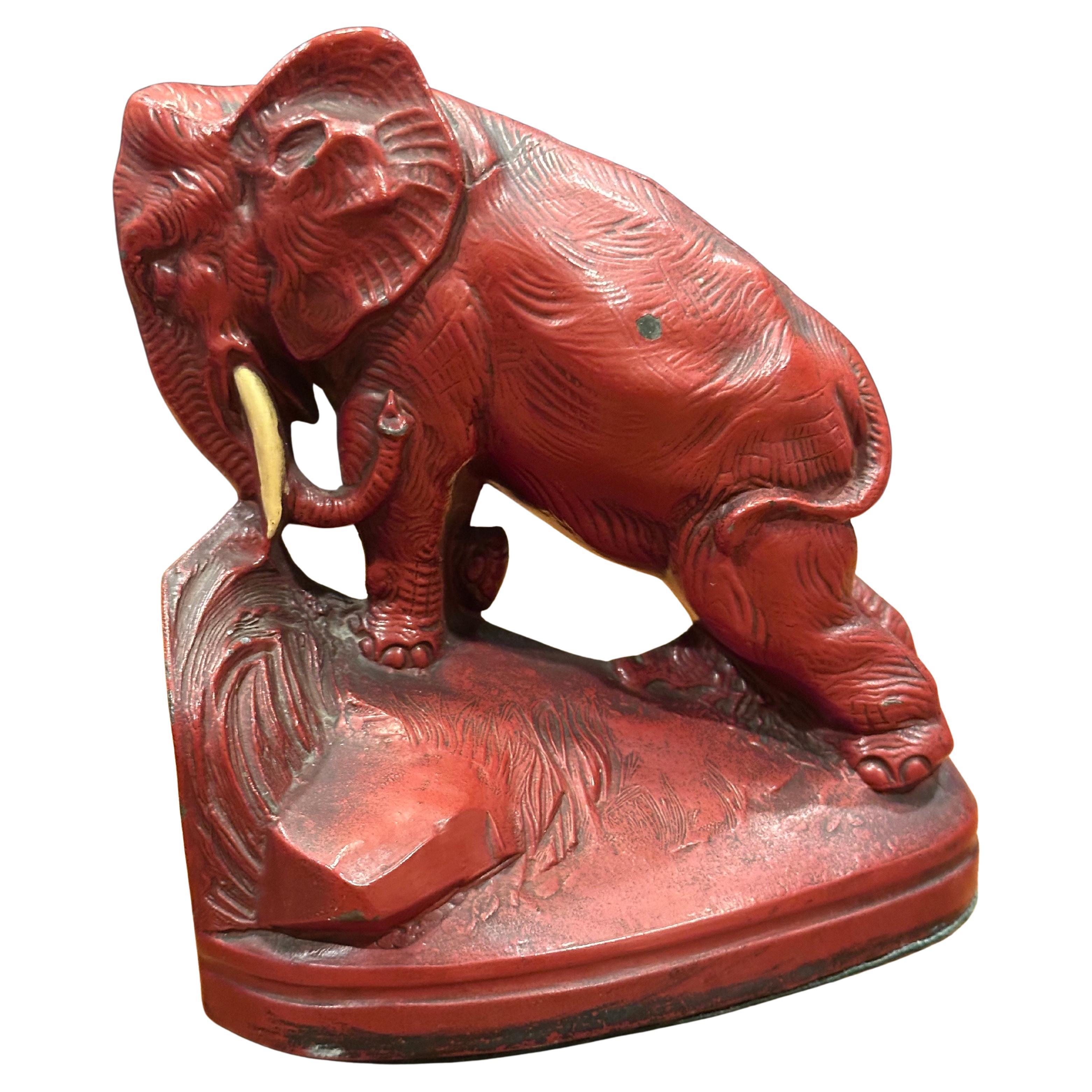 Pair of Art Deco Red Painted Charging Elephant Bookends In Good Condition For Sale In San Diego, CA