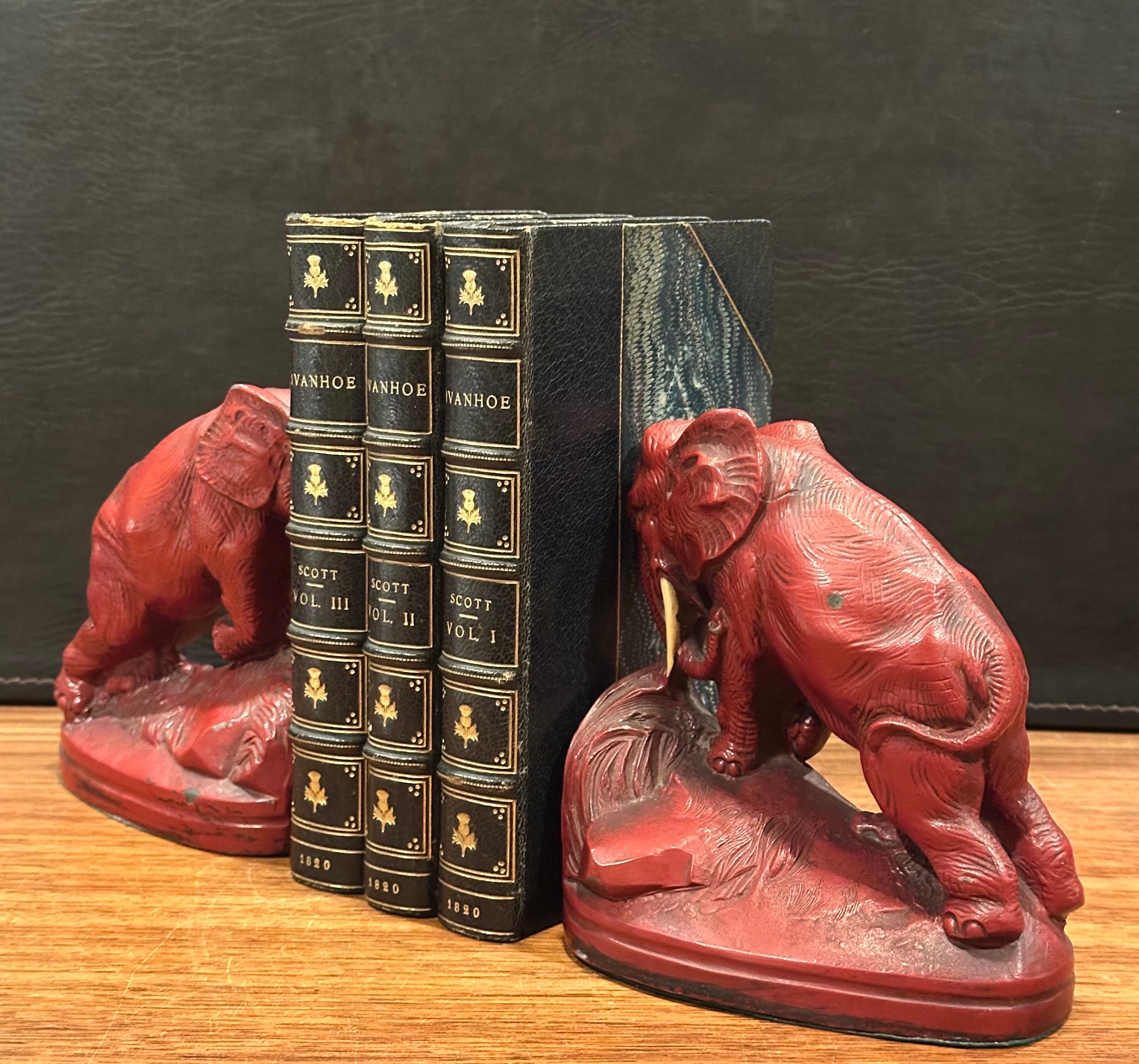 Pair of Art Deco Red Painted Charging Elephant Bookends For Sale 1