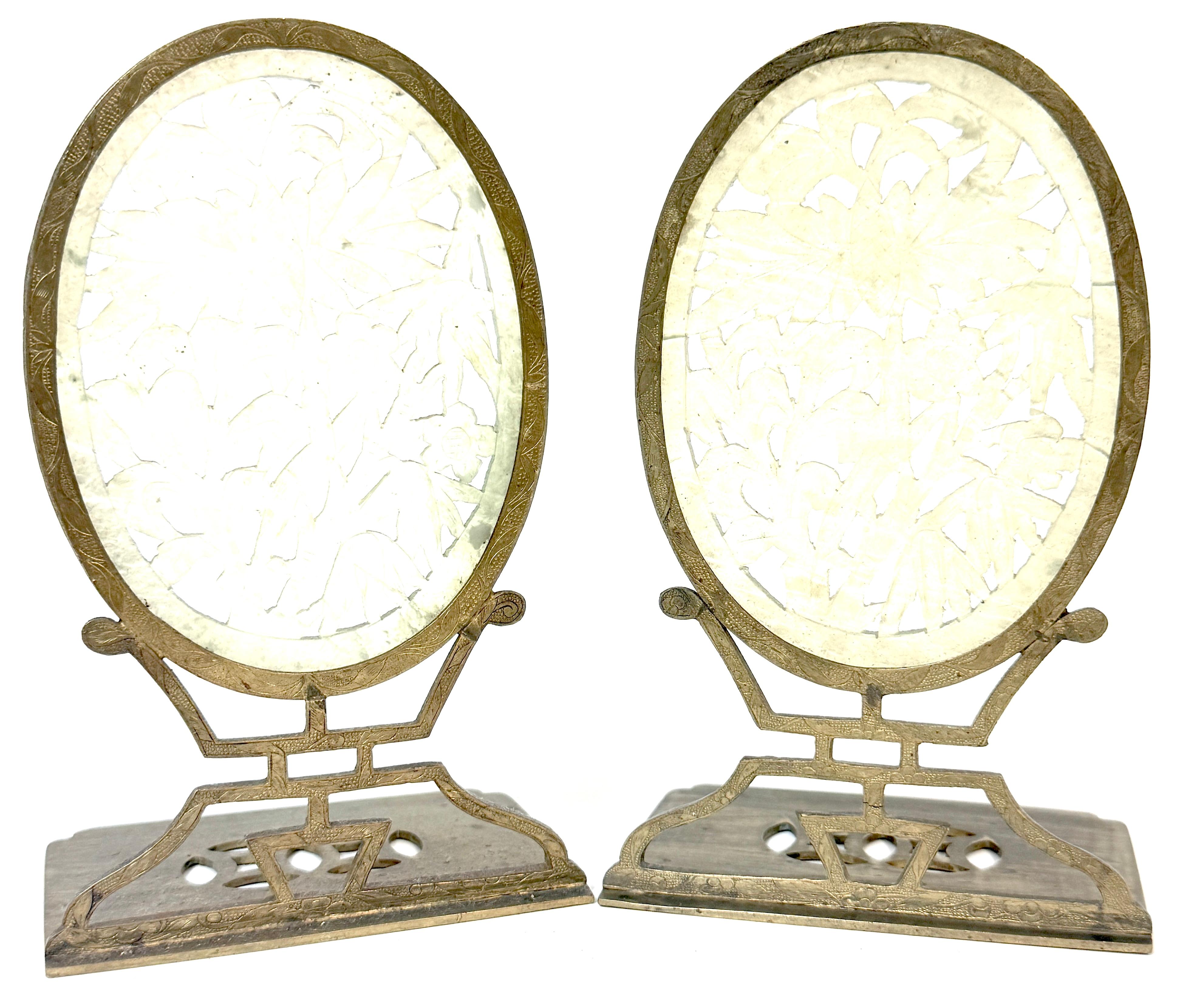 Pair of Chinese Export Carved Jade and Brass Bookends, Republic Period, circa 1920s

Description:
A finely crafted pair of Chinese export bookends featuring pierced and carved jade (or hardstone) plaques mounted in brass frames, dating to the early