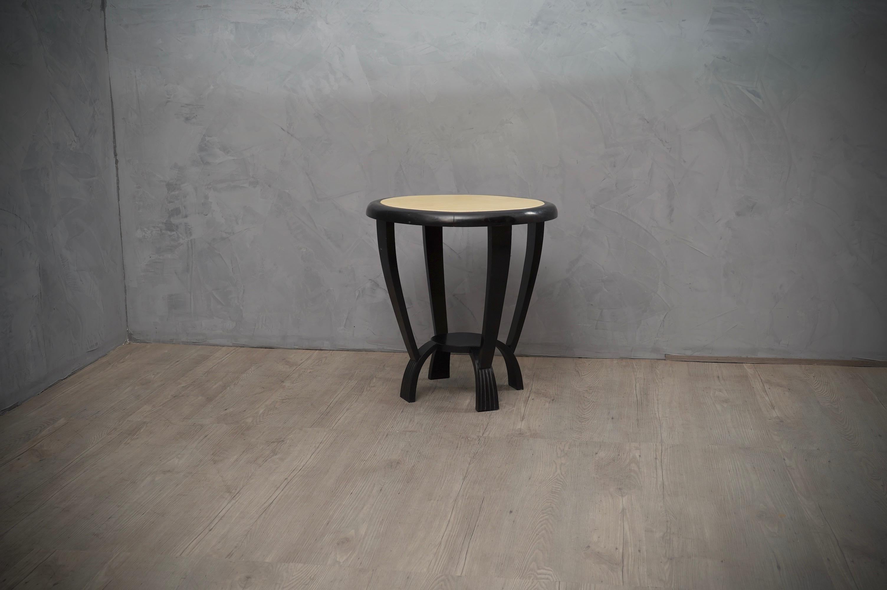 Rich design for this couple of side tables, polished with black shellac and covered with goatskin.

Top is covered in parchment leather, and then well-polished. A single piece of leather for the top table, even more difficult to find, very