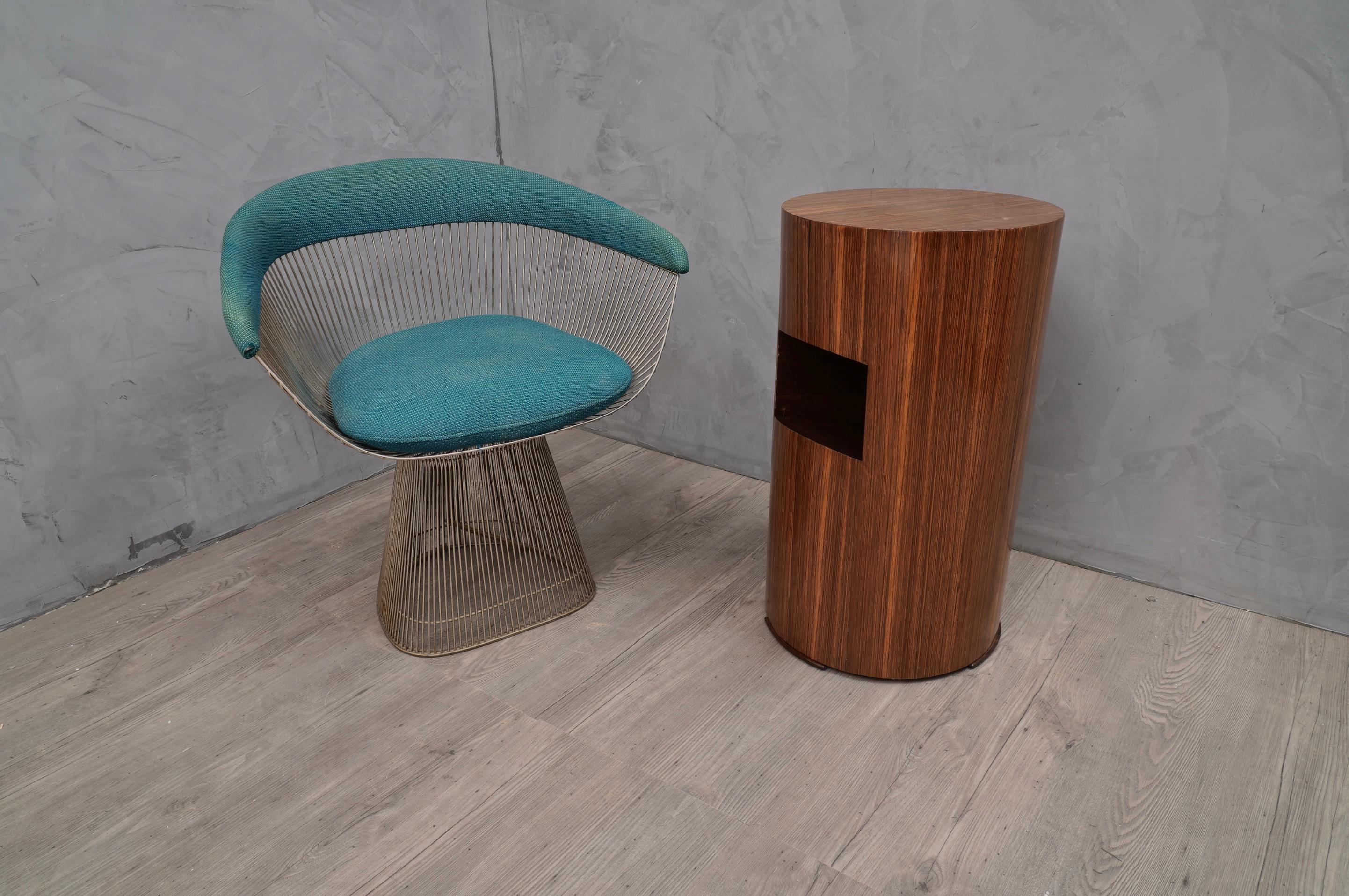 Italian Art Deco tables. All veneered in zebra wood. 

Cylindrical shape with a hole as a magazine holder. The veneer is very particular positioned with the veining from the top downwards. Also the top is veneered in zebra wood and forms a sharp