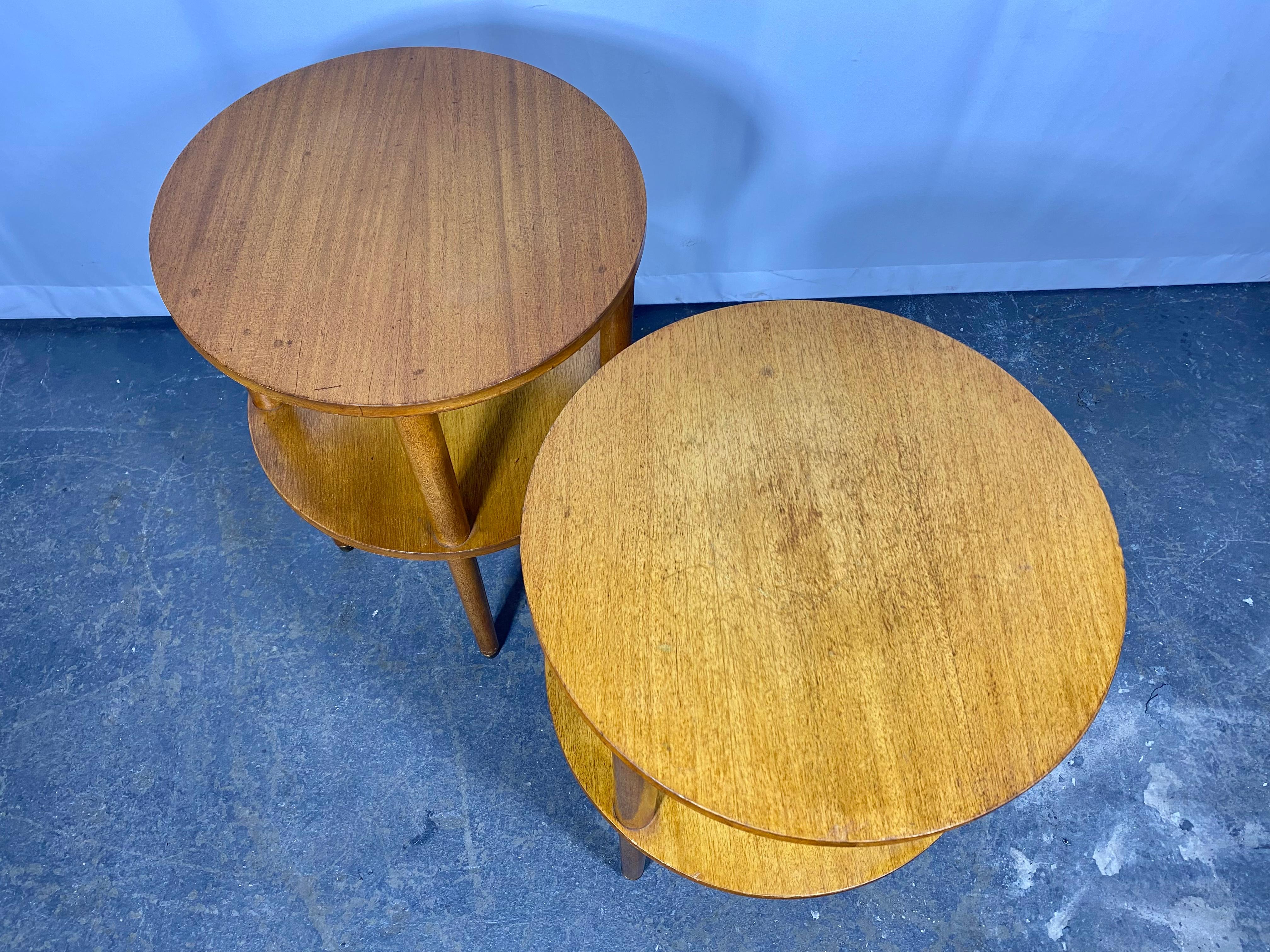 Brass Pair of Art Deco round two tier tables designed by Alfons Bach  For Sale
