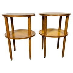 Pair of Art Deco round two tier tables designed by Alfons Bach 