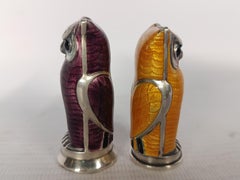 Pair of Art Deco salt shakers silver and enameled