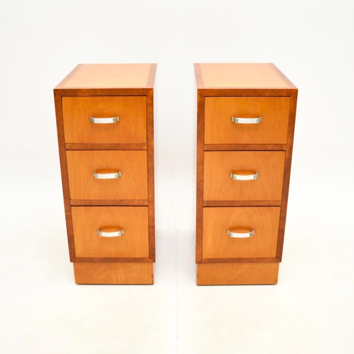 A sleek and stylish pair of Art Deco satinwood and walnut bedside chests. They were made in England, they date from the 1930’s.

They are of amazing quality and are a very useful size. They are tall and narrow, offering plenty of storage space