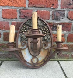 Ein Paar Art-Déco-Wandleuchten im Stil von Edgar Brandt