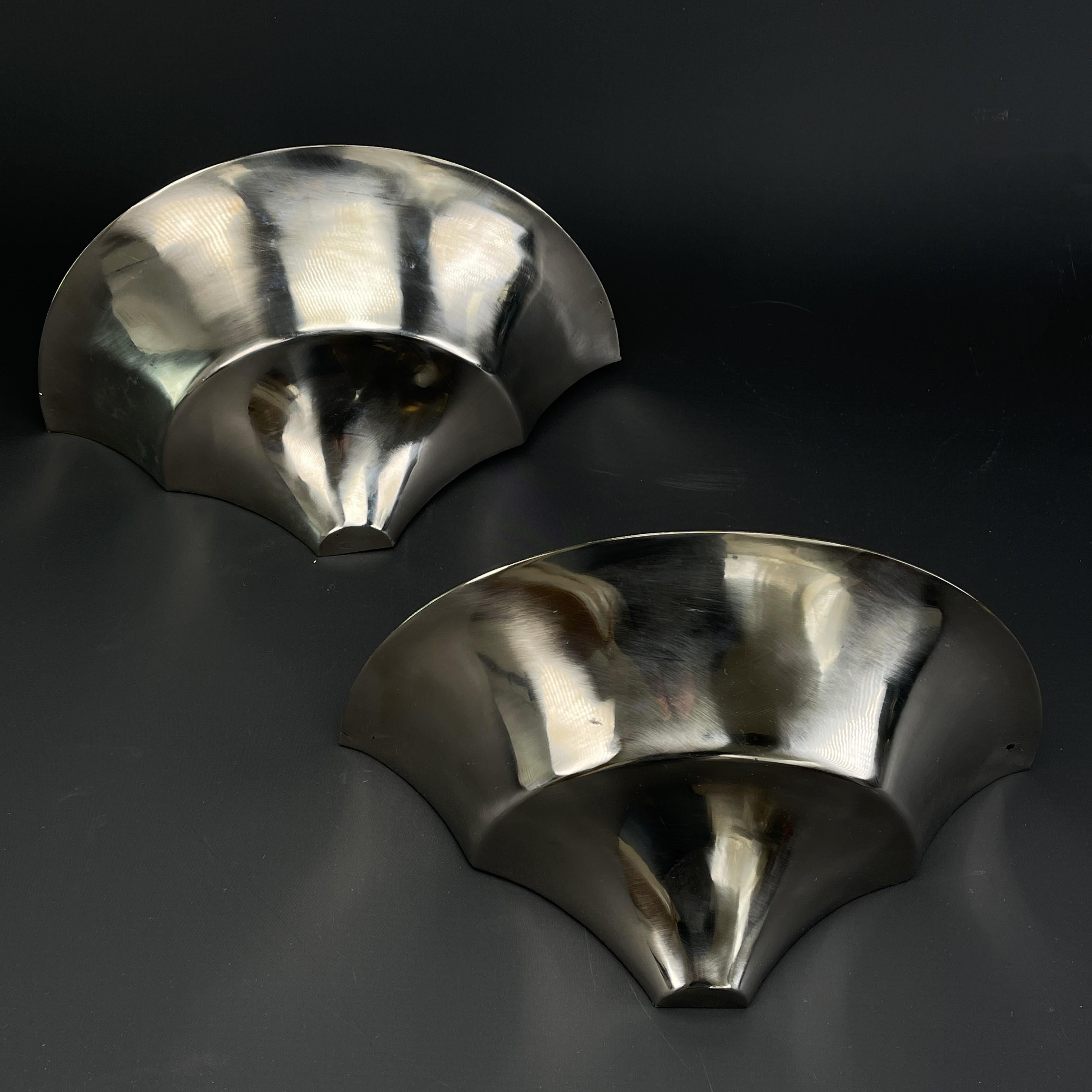 Pair Art Deco sconces, 1930s

These original ART DECO wall lights are characterised by their simple and functional design. The two lamps provide a very pleasant light. These wall lamps are an absolute design classic from the ART DECO period.

The