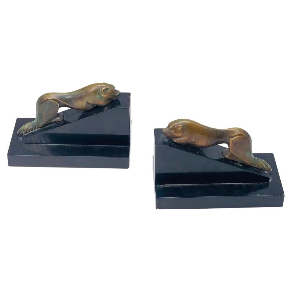 Pair of Art Deco See Lions Book ends, Bronze and Marble, Black, France, 1940 For Sale