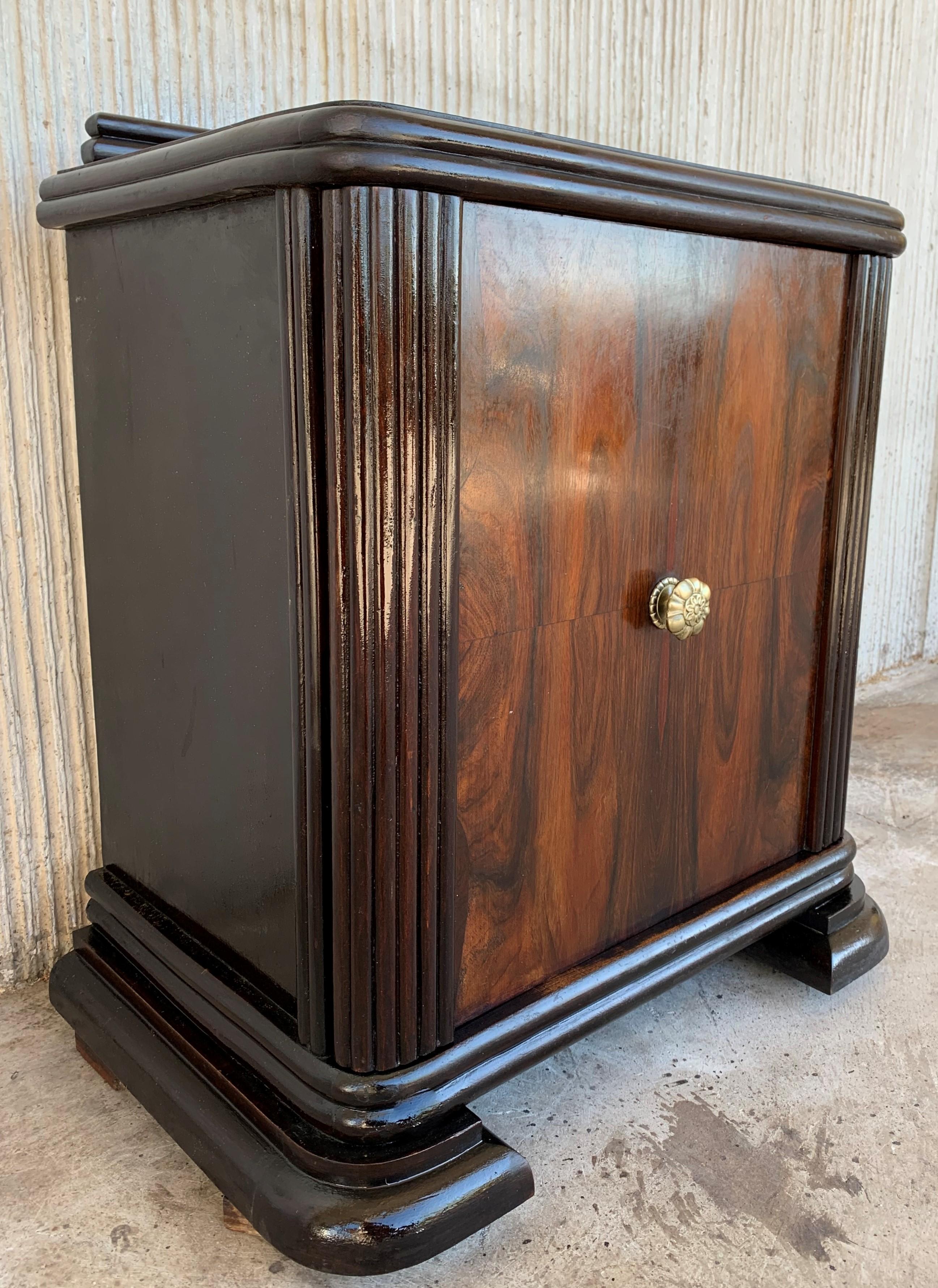 This pair of circa 1930s French Art Deco side cabinets could be used to flank a sofa or as nightstands. Beautiful burl walnut door with original bronze pull. When you open the door , each table has two drawers and two big box storage compartments.